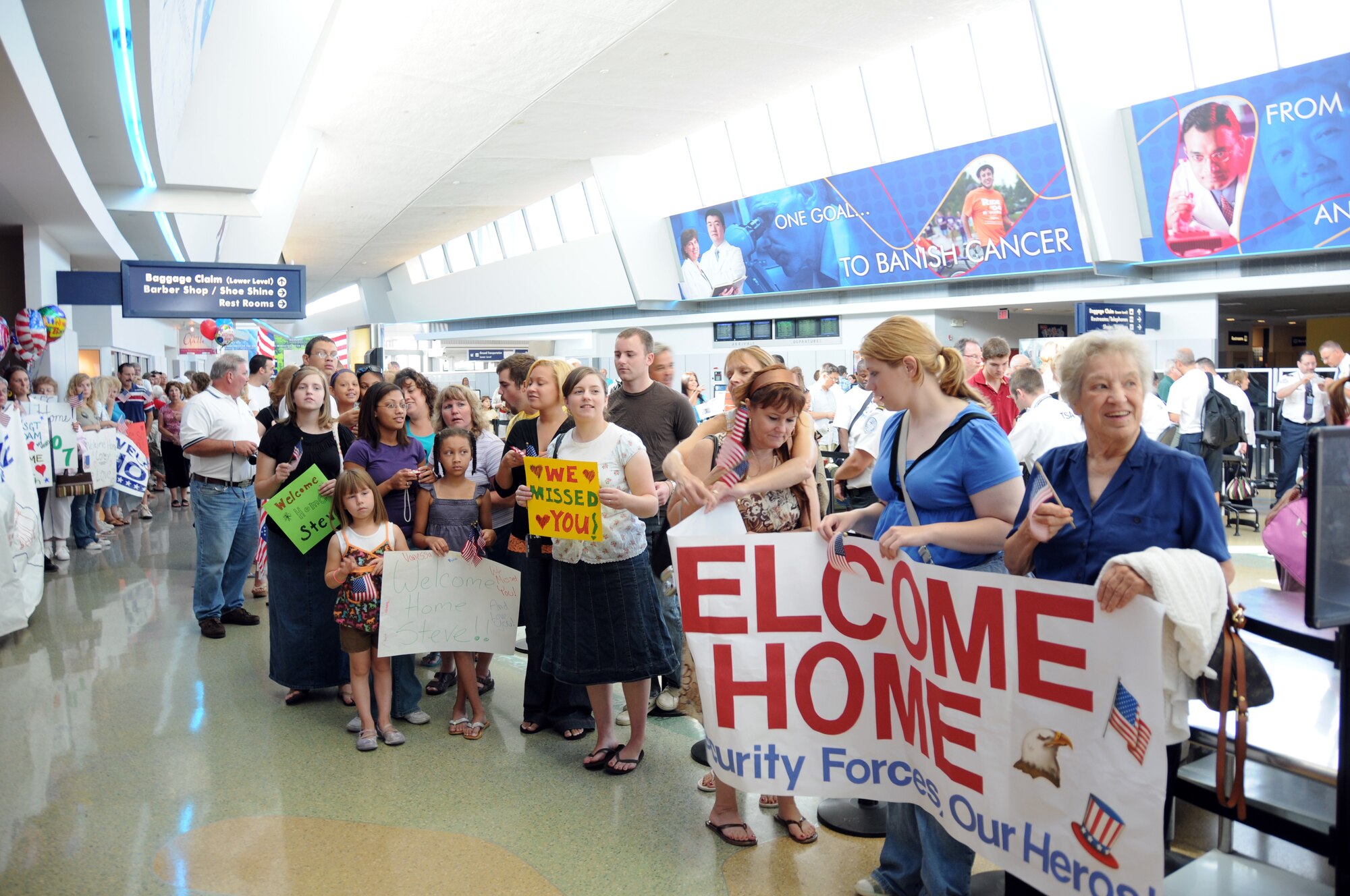 More than 100 friends, families and loved ones eagerly await the return of the 107th AW Security Force Squadron.  (U.S. Air Force photo/Senior Airman Peter Dean)