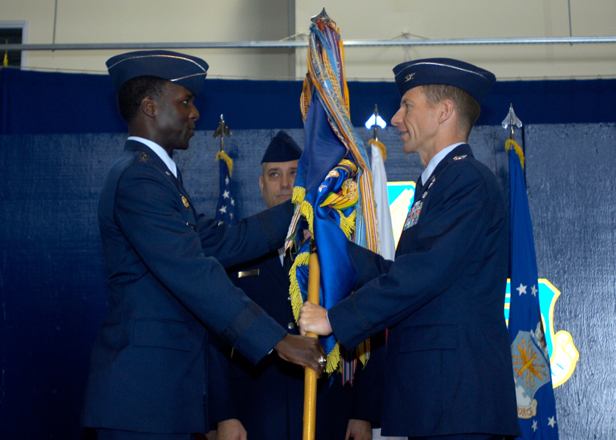 MISAWA AIR BASE, Japan -- Lt. Gen. Edward Rice, Jr., commander of U.S. Forces Japan and 5th Air Force, hands the wing guidon to Col. David Stilwell, 35th Fighter Wing commander, during the wing change of command ceremony Aug. 25, 2008.  Colonel Stilwell served as the 57th Adversary Tactics Group commander, Nellis Air Force Base, Nev., before being assigned to Misawa AB.  (U.S. Air Force photos by Senior Airman Chad Strohmeyer)