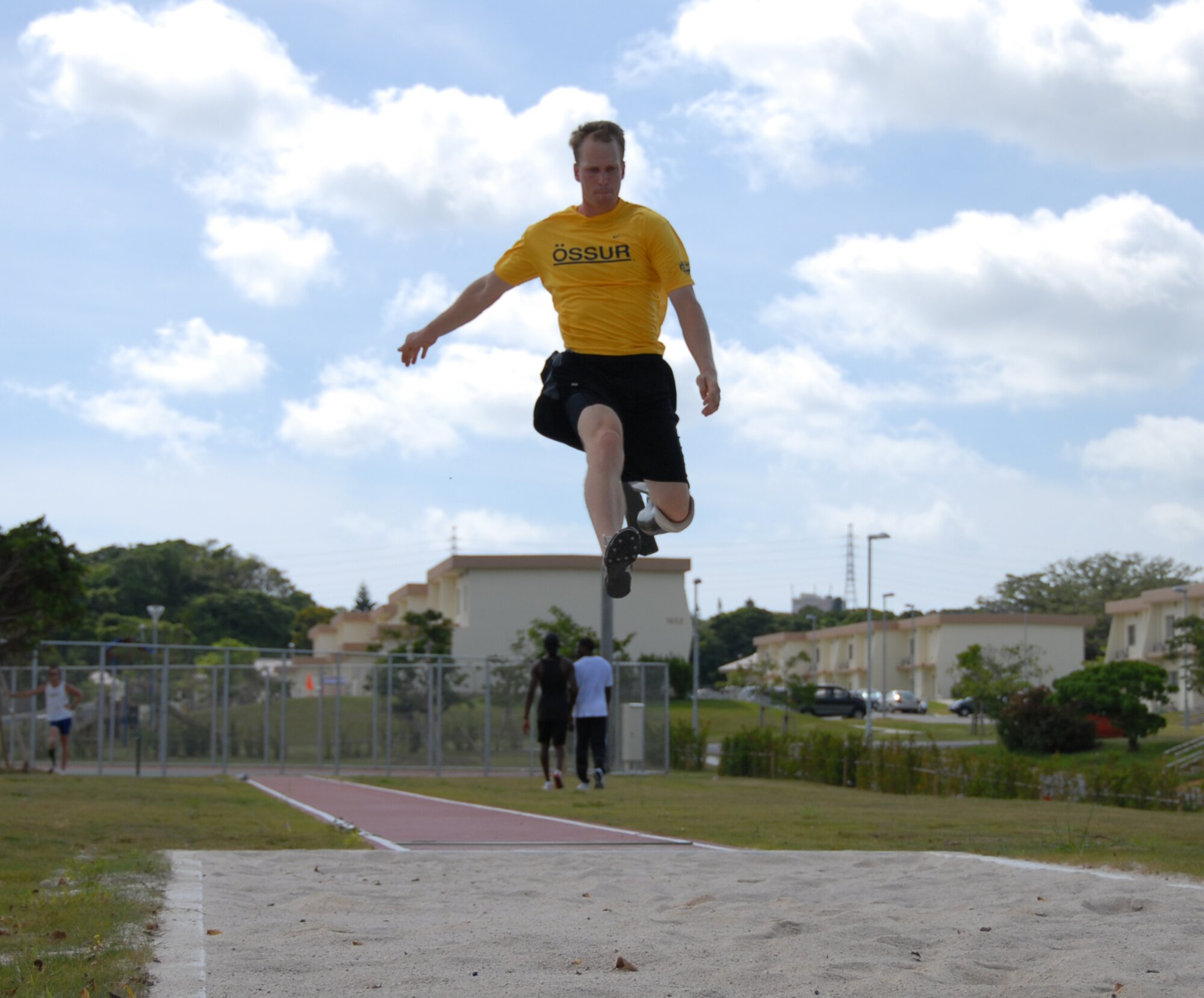 U.S. Paralympian Jeff Skiba of Chula Vista, Calif. practices the long jump
at Kadena Air Base Aug. 26. More than 100 athletes and support staff from
the U.S. Paralympic track and field and swim teams arrived at Kadena Aug. 24
to live and train for ten days in preparation for the 2008 Paralympic games
being held in Beijing, China Sept. 6-17. (U.S. Air Force photo by Airman
First Class Aaron Johnson)