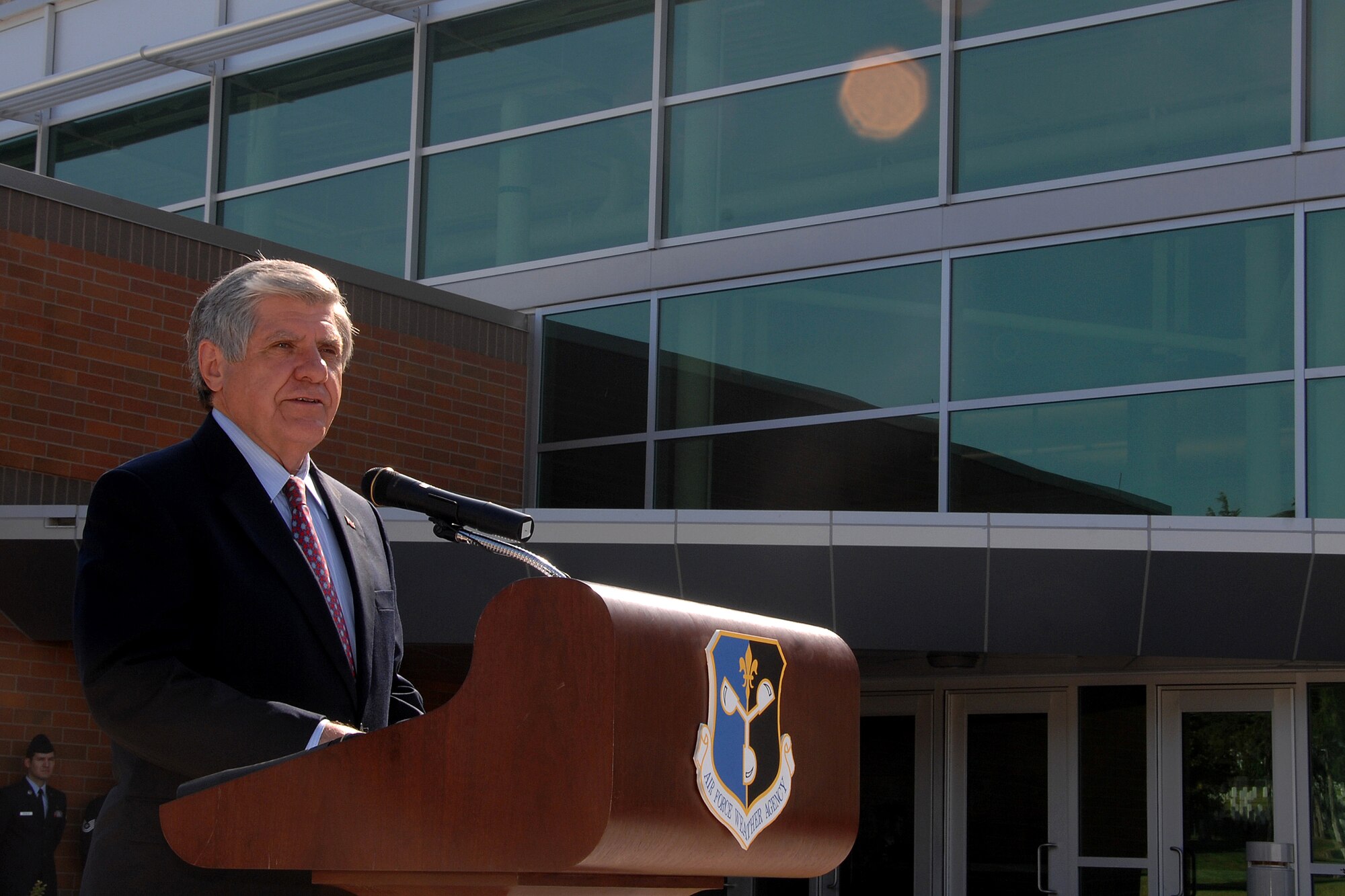 OFFUTT AIR FORCE BASE, Neb. -- U.S. Senator Ben Nelson of Nebraska addresses attendees and members of the Air Force Weather Agency as they officially dedicated their new $30-million headquarters building during a ribbon cutting ceremony here Aug. 22. The new building was dedicated to Lt. Gen. Thomas S. Moorman and is Air Combat Command’s first Leadership in Energy and Environmental Design green rated facility. (U.S. Air Force Photo by Kevin Schwandt)