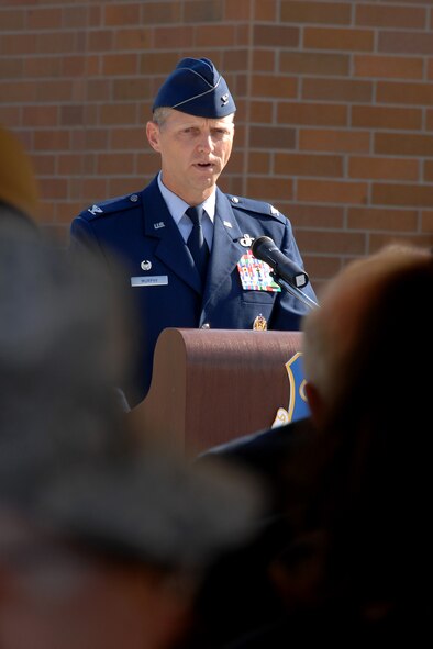 OFFUTT AIR FORCE BASE, Neb. -- Col. John Murphy, Air Force Weather Agency commander, addresses attendees and members of AFWA as they officially dedicated their new $30-million headquarters building during a ribbon cutting ceremony here Aug. 22. The new building was dedicated to Lt. Gen. Thomas S. Moorman and is one of Air Combat Command’s first Leadership in Energy and Environmental Design green rated facilities. (U.S. Air Force Photo by Kevin Schwandt)