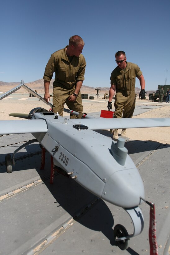 Lance Cpl. Corey D’Angelo, an unmanned aerial vehicle mechanic with VMU-1, goes through post flight mechanical checks on the RQ-7 Shadow UAV Aug. 27 at the Expeditionary Airfield during the squadron’s last training exercise before deploying to Iraq.