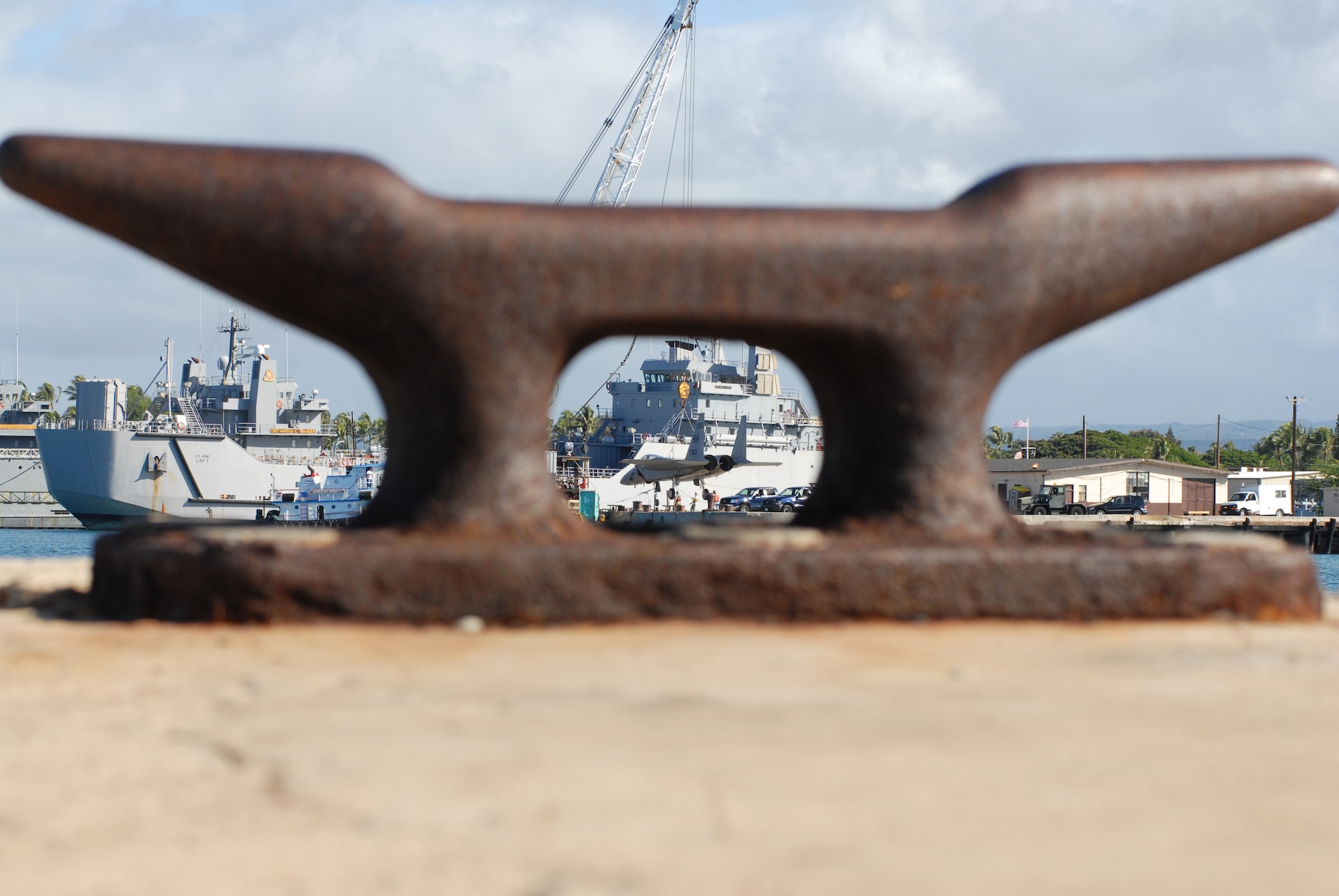 HICKAM AFB, HI – From a World War II landing dock cleat near Bishops Point an F-15 Strike Eagle from the Hawaii Air National Guard is hoisted to a barge for its final leg of a four hour journey to the Pacific Aviation Museum Pearl Harbor, Ford Island Hawaii, Aug.26, 2008.  (U.S. Air Force Photo/ Master Sgt. Robert Burgess)