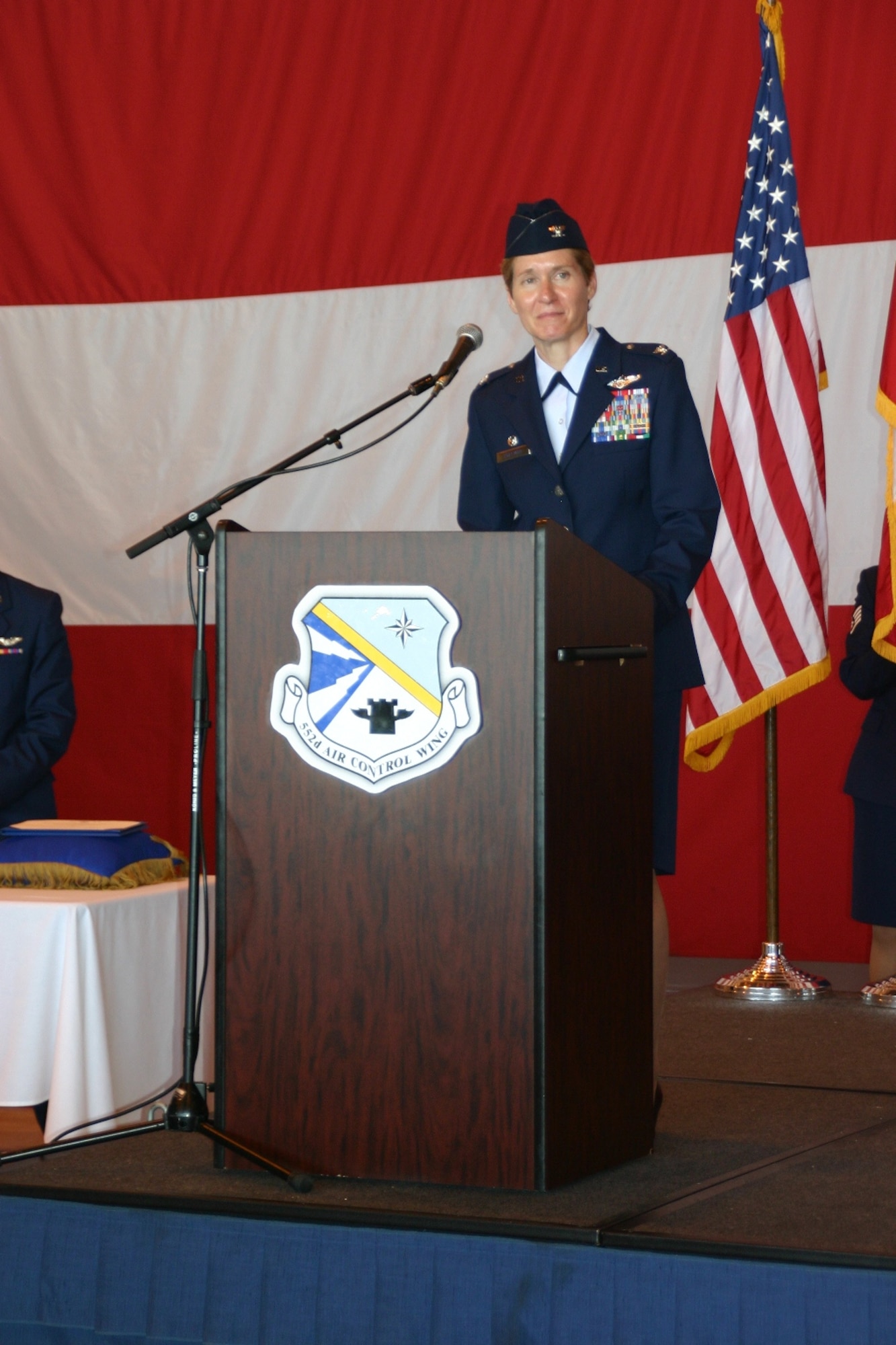 Col. Patricia Hoffman addresses her Airmen for the first time as the new 552nd Air Control Wing Commander. Photo Courtesy of 2nd Lt. Kinder Blacke.