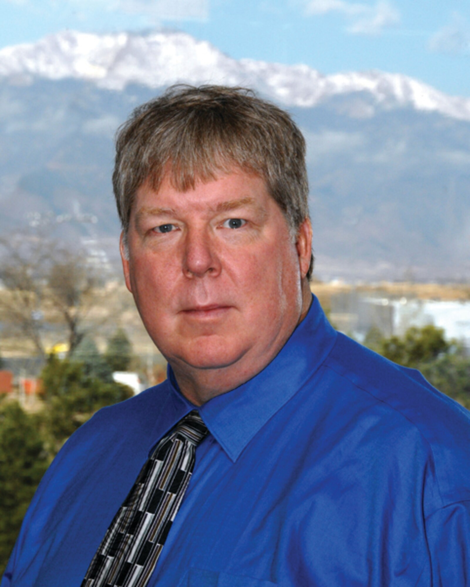 Edward White is a journalist with Air Force Space Command Public Affairs.
Mr. White has 25 years experience as a journalist, covering a wide range of
topics from government civil engineering projects to environmental issues as
well as space. (U.S. Air Force photo/Duncan Wood)
