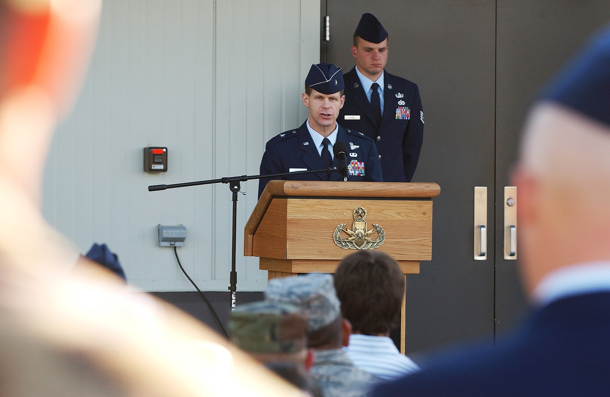 Brig. Gen. Mark Graper, 354th Fighter Wing commander, speaks during a memorial dedication ceremony in honor of Master Sgt. Brad Clemmons, 354th Civil Engineer Squadron explosive ordnance disposal flight, Aug. 21, 2008, at Eielson Air Force Base, Alaska. Sergeant Clemmon's family, friends and co-workers attended the building dedication ceremony to honor his ultimate sacrifice.  (U.S. Air Force photo by Airman 1st Class Jonathan Snyder)
