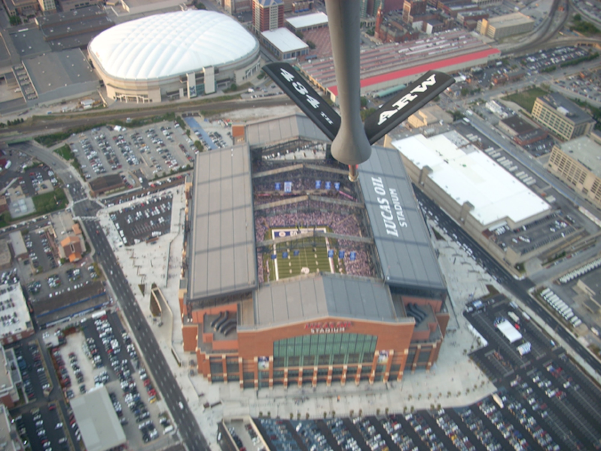 GRISSOM AIR RESERVE BASE, Ind.,  -- The boom of a KC-135R Stratotanker is visible from the boom operator's point of view as a tanker from the 434th Air Refueling Wing conducts a flyover of the new Lucas Oil Stadium in Indianapolis, Ind.  The flyover was conducted as part of the opening ceremonies before the Indianapolis Colts-Buffalo Bills pre-season NFL game on August 24.  (U.S. Air Force photo/Tech. Sgt. Joe Swisher)     