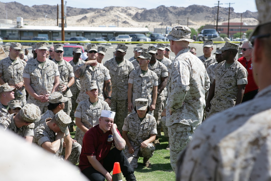 Col. Brian McGuire, physical readiness programs officer, TECOM, speaks to Marines about the new changes for the Marine Corps Physical Fitness Program after the Combat Fitness Test demonstration to answer any questions during the Marine Corps Training and Education Command’s Fitness Roadshow at the Combat Center Aug. 28.