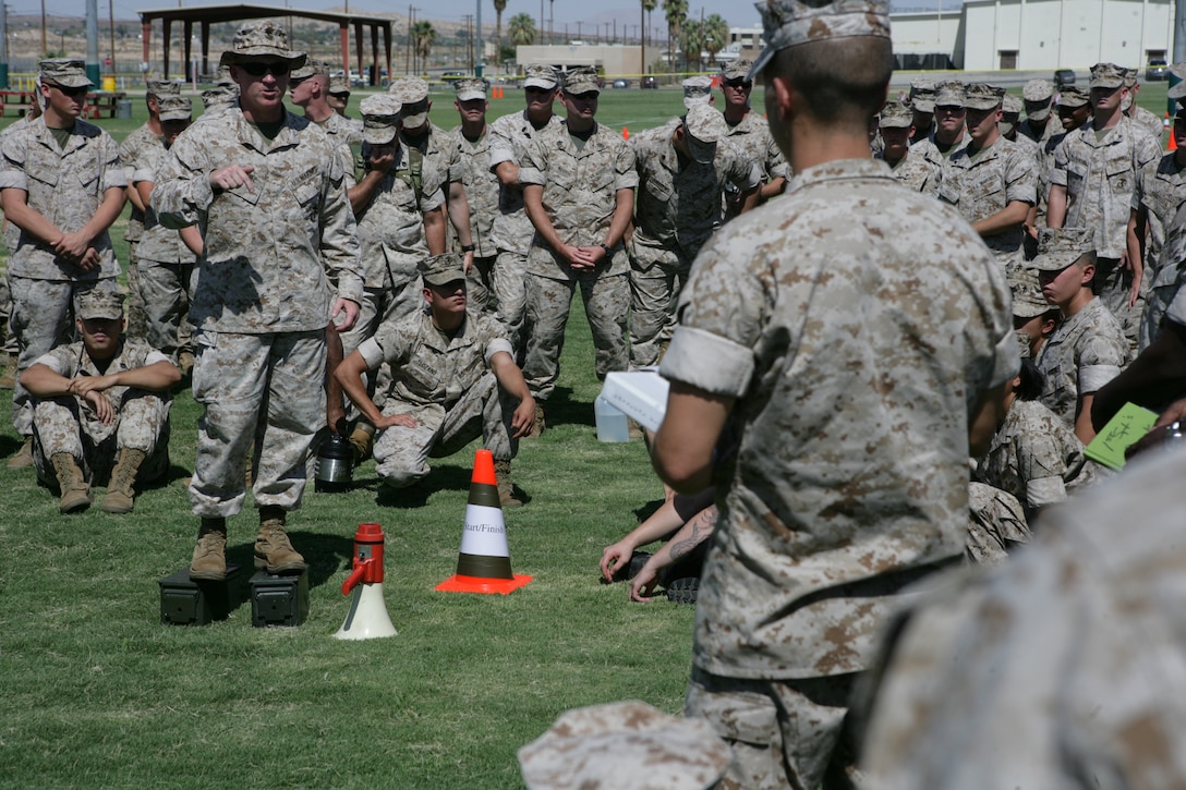 Col. Brian McGuire, physical readiness programs officer, TECOM, speaks to Marines about the new changes for the Marine Corps Physical Fitness Program after the Combat Fitness Test demonstration to answer any questions during the Marine Corps Training and Education Command’s Fitness Roadshow at the Combat Center Aug. 28.