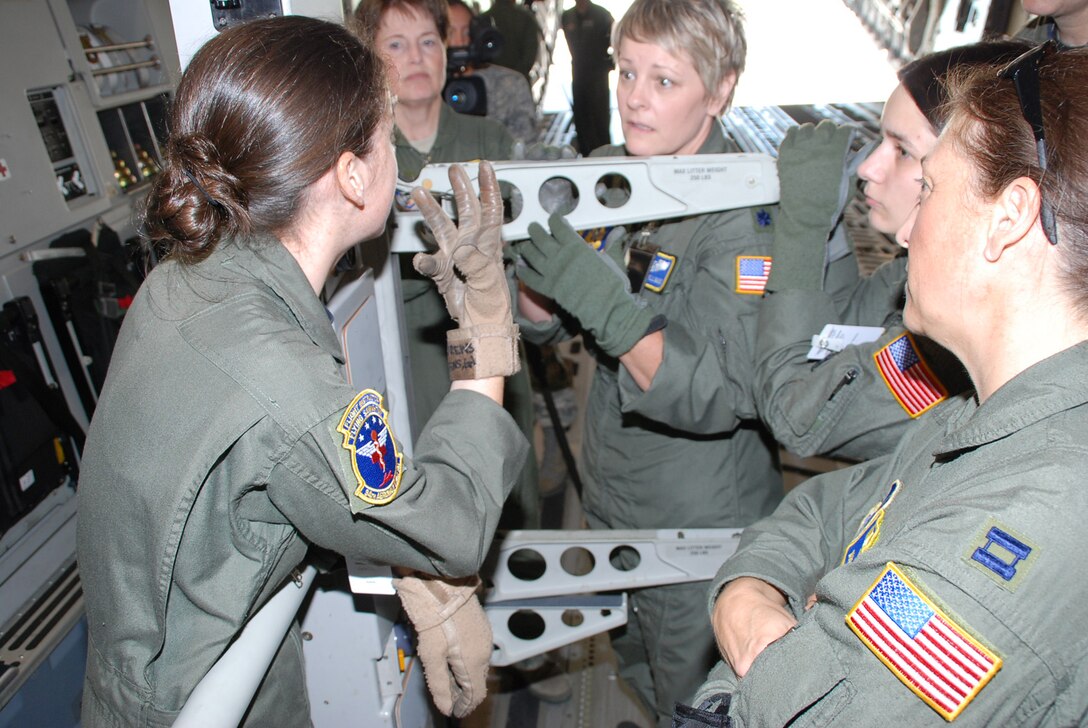 The active duty 375th Airlift Wing and Air Force Reserve 932nd Airlift Wing welcomed AE JAMBOREE participants from Air Force Reserve Command units in California, Minnesota, and Georgia for a three day event. Members must carry and set up a lot of medical equipment during the course of a day. (U.S. Air Force photo by Tech. Sgt. Dan Oliver) 