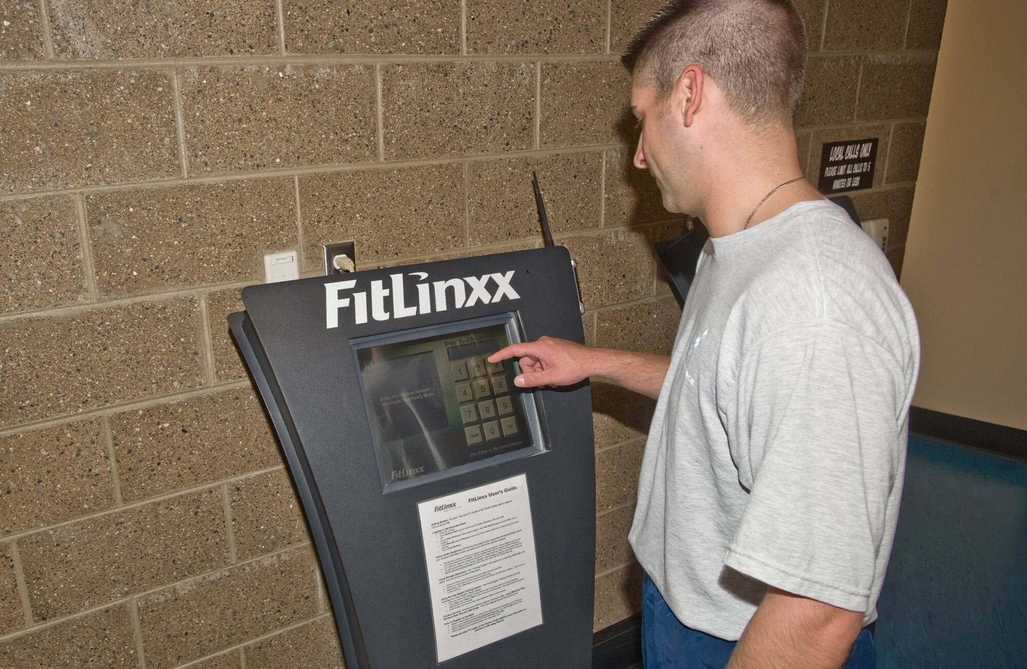 ELMENDORF AIR FORCE BASE, Alaska -- An Arctic Warrior signs into his Fitlinxx account at the kiosks at the Elmendorf Fitness Center Aug. 28. The Fitlinxx program has been available at Elmendorf for nearly 10 years. (U.S. Air Force photo/Airman 1st Class Matt Owens)