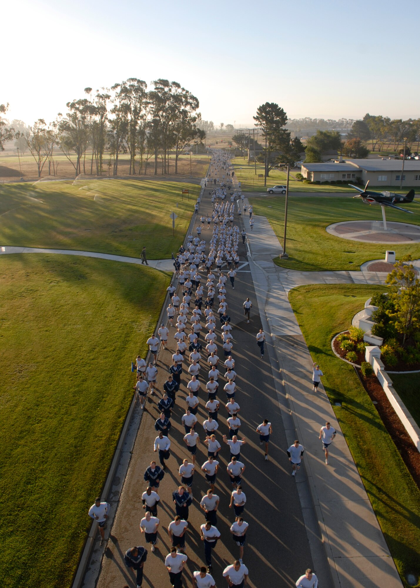 VANDENBERG AIR FORCE BASE, Calif. -- Airmen take part in the 30th Space Wing 5K Wing Run here Aug. 9.  Airmen in the 30th Space Wing run together every month, showing the "Fit to Fight" force on base .  (U.S. Air Force photo/Airman 1st Class Andrew Satran)
