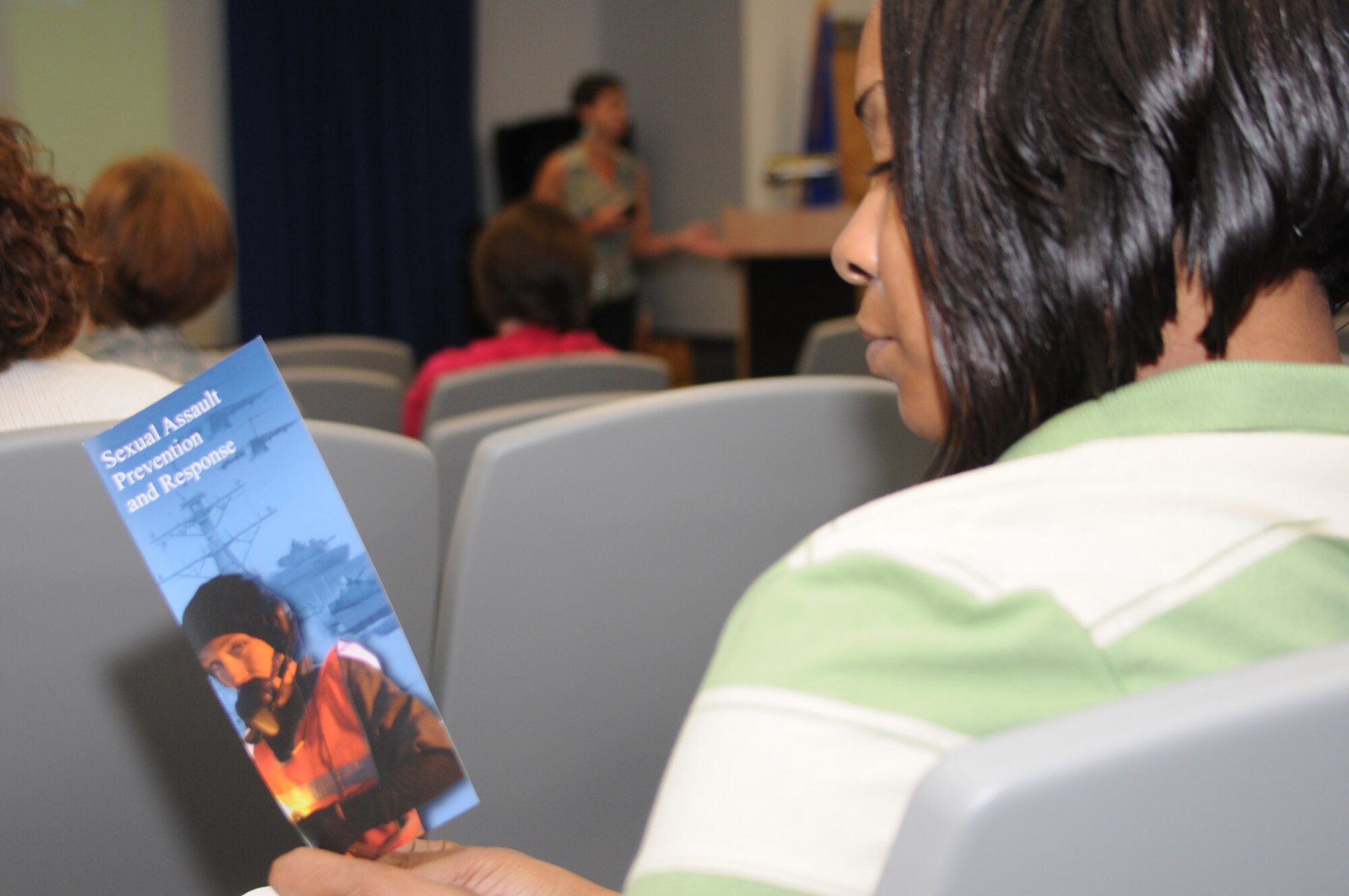 Staff Sgt. Kirstin Richard, 81st Medical Support Squadron, reviews a sexual prevention and response brochure during a victim advocates training session Aug. 20.  Heather Wagner, Mississippi special assistant attorney general and director of the domestic violence division, conducted domestic violence and sexual assault training.  Shalotta Sharp, a nurse with the Mississippi Coalition Against Sexual Assault, gave a briefing on emergency department care for sexual assault victims.  (U.S. Air Force photo by Kemberly Groue)