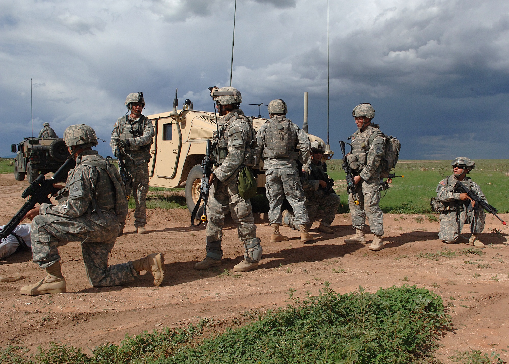 Soldiers from the 1-77th Armor, 4th Brigade, 1st Armor Division, Fort Bliss, Texas, tactfully maneuver during a joint force exercise Aug. 12, at McGregor Range, New Mexico.  (U.S. Air Force photo by Airman 1st Class John D. Strong II)