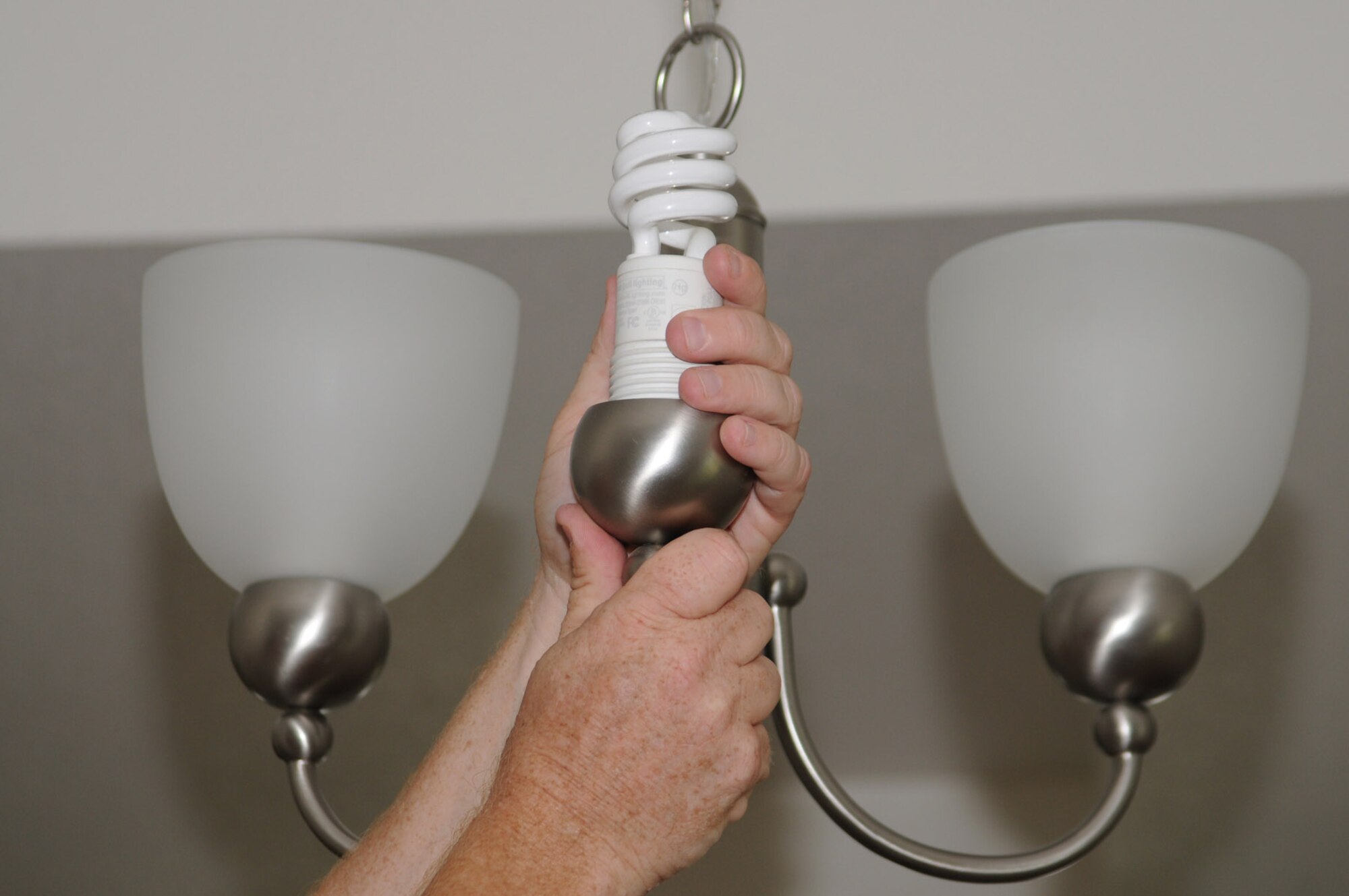 Energy Efficient light bulbs are installed in light fixtures throughout the LEED house.  (U.S. Air Force photo by Kemberly Groue)