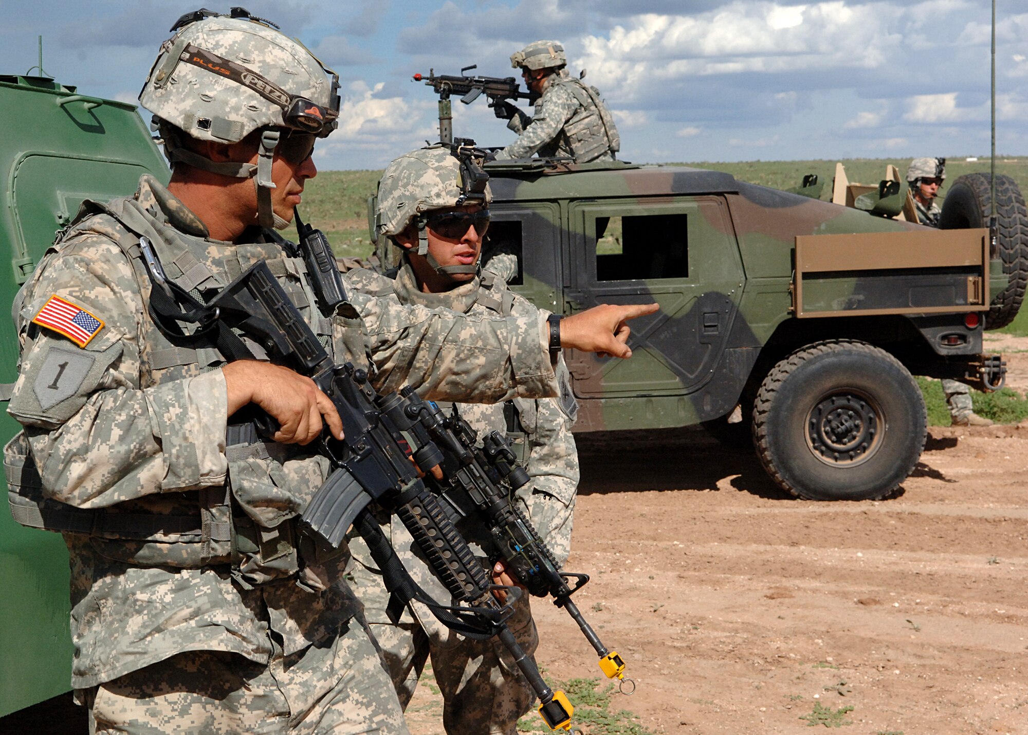 Army Spc. Wayne Hand, 1-77th Armor, 4th Brigade, 1st Armor Division, Fort Bliss, Texas, points to his next destination Aug. 12, at McGregor Range, New Mexico.  (U.S. Air Force photo by Airman 1st Class John D. Strong II)