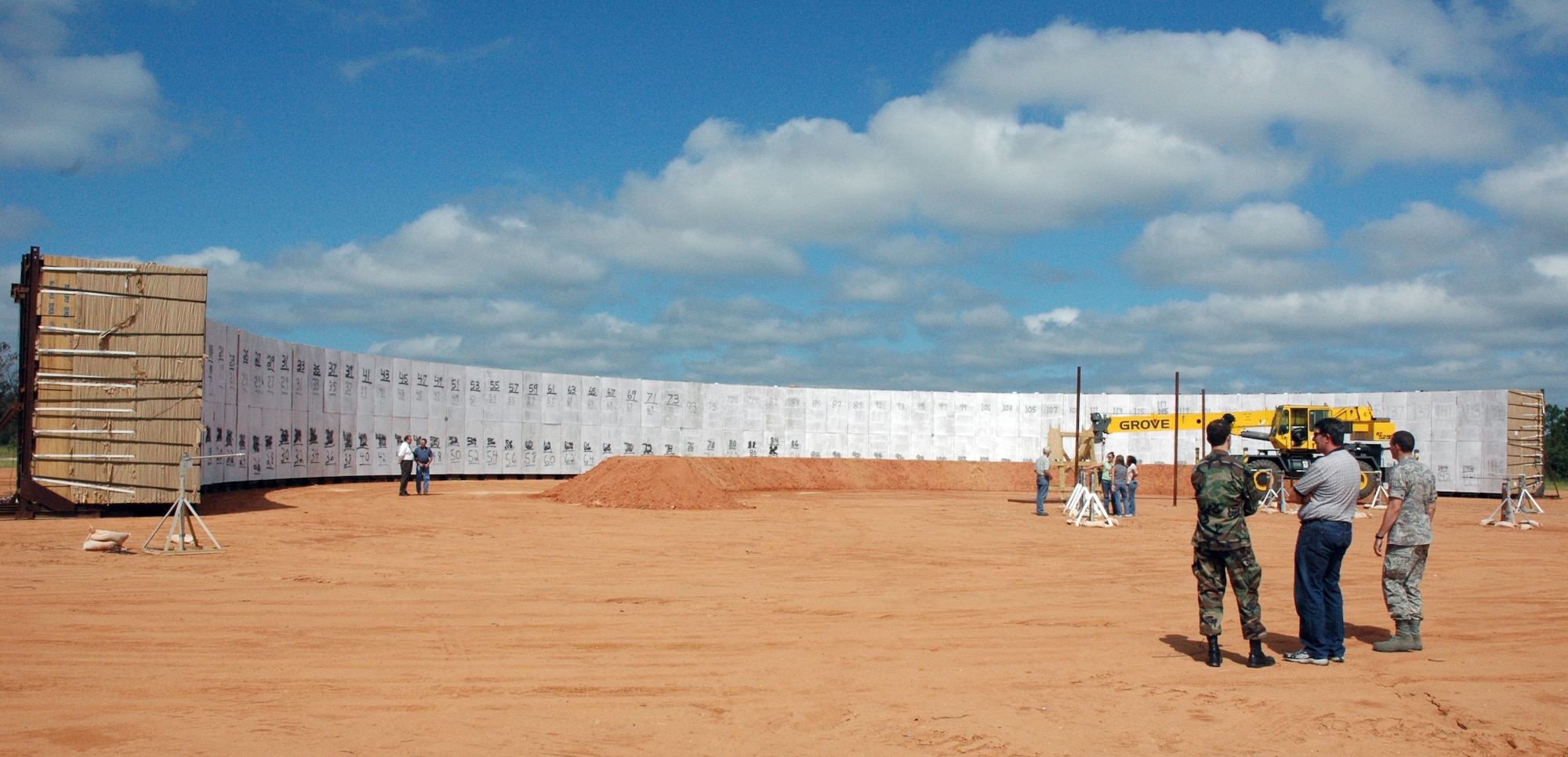 EGLIN AIR FORCE BASE, Fla. -- Contractors, customers, and others involved with the testing of a BLU-109X/B, conduct a pre-inspection of the arena where the munition will be detonated.