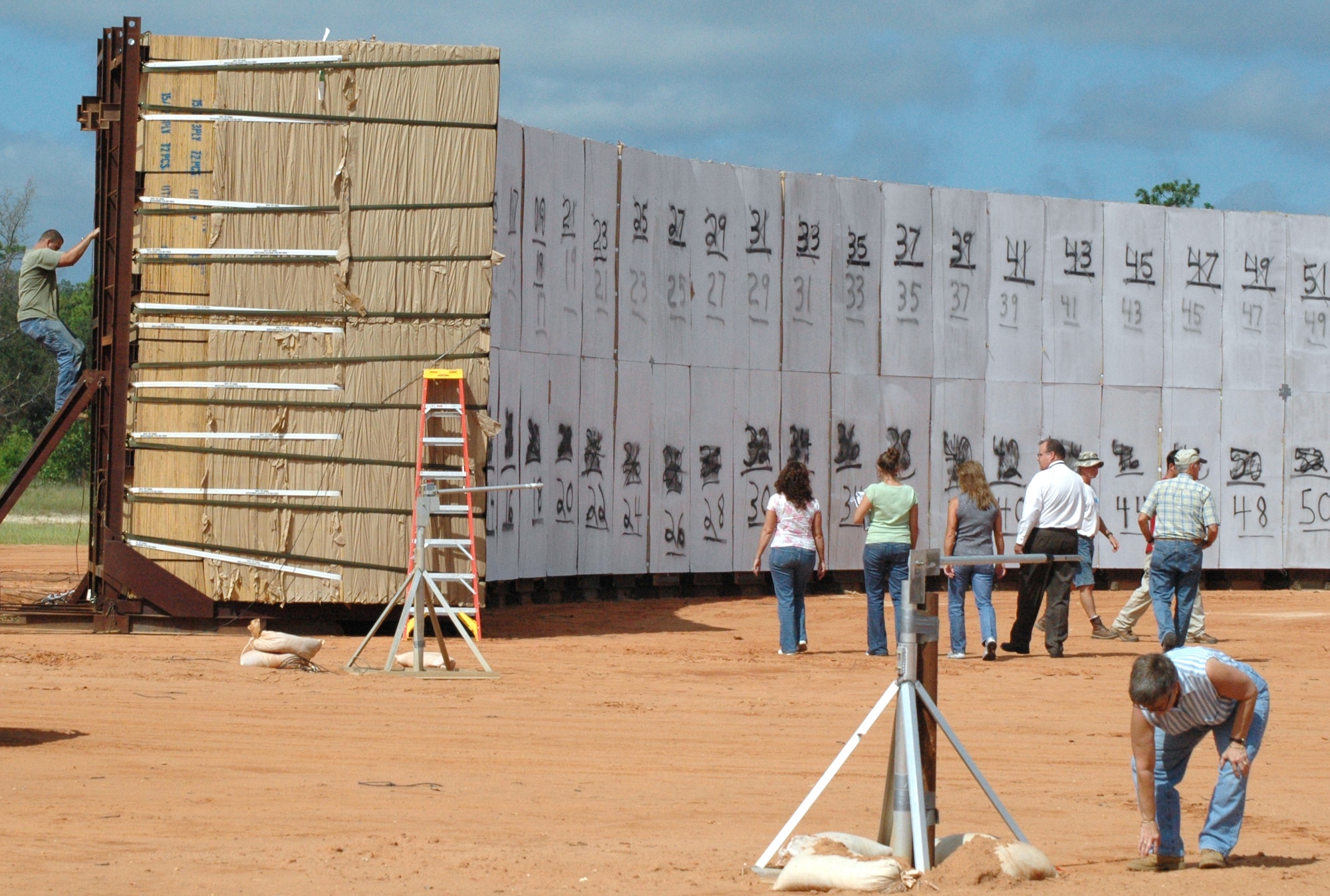 EGLIN AIR FORCE BASE, Fla. -- Contractors, customers, and others involved with the testing of a BLU-109X/B, conduct a pre-inspection of the arena where the munition will be detonated.