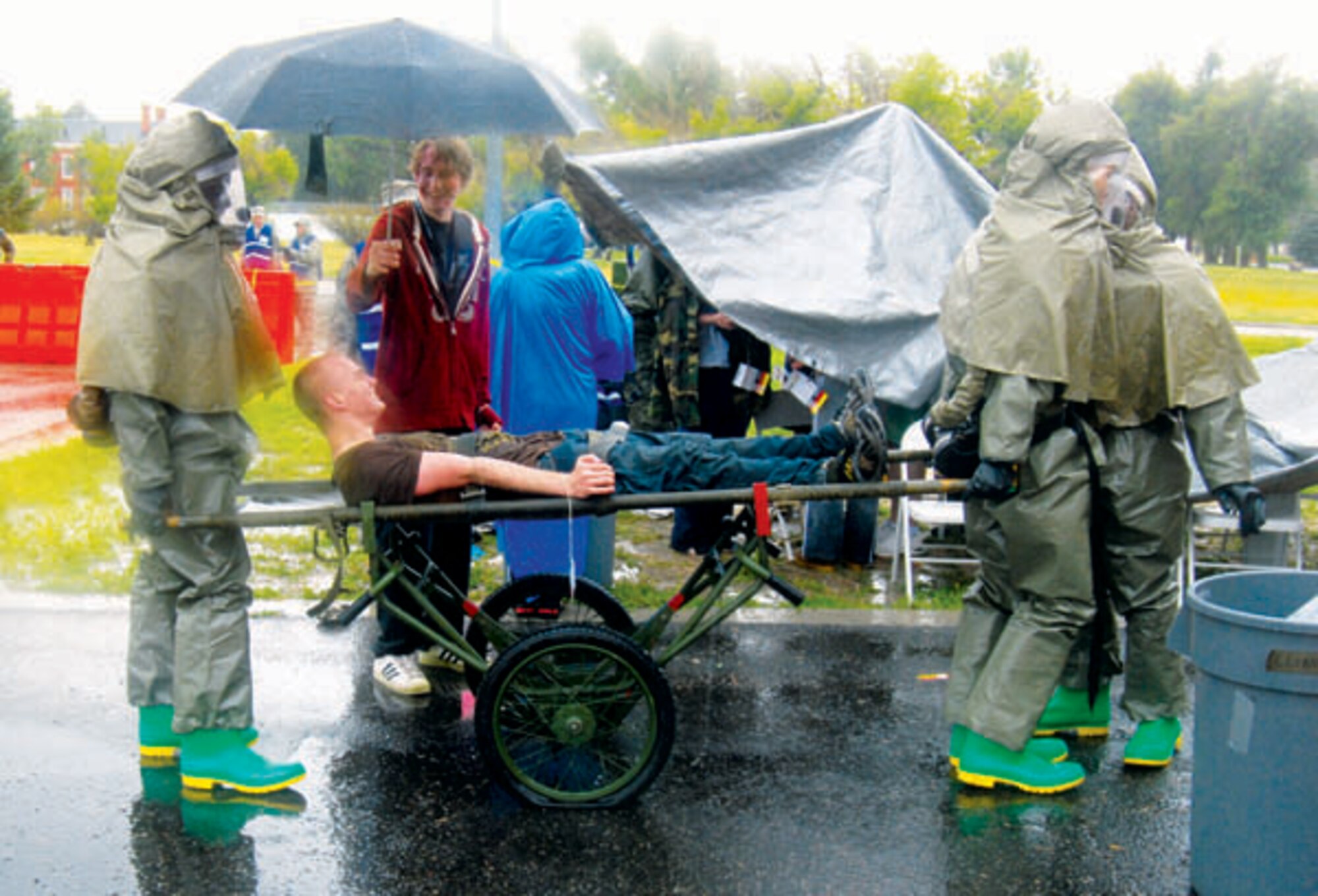 Senior Master Sgt. John Balmer, medical technician, ensures proper procedures are being followed Friday during the exercise while waiting at the immediate team stationed inside the family practice area of the clinic. 