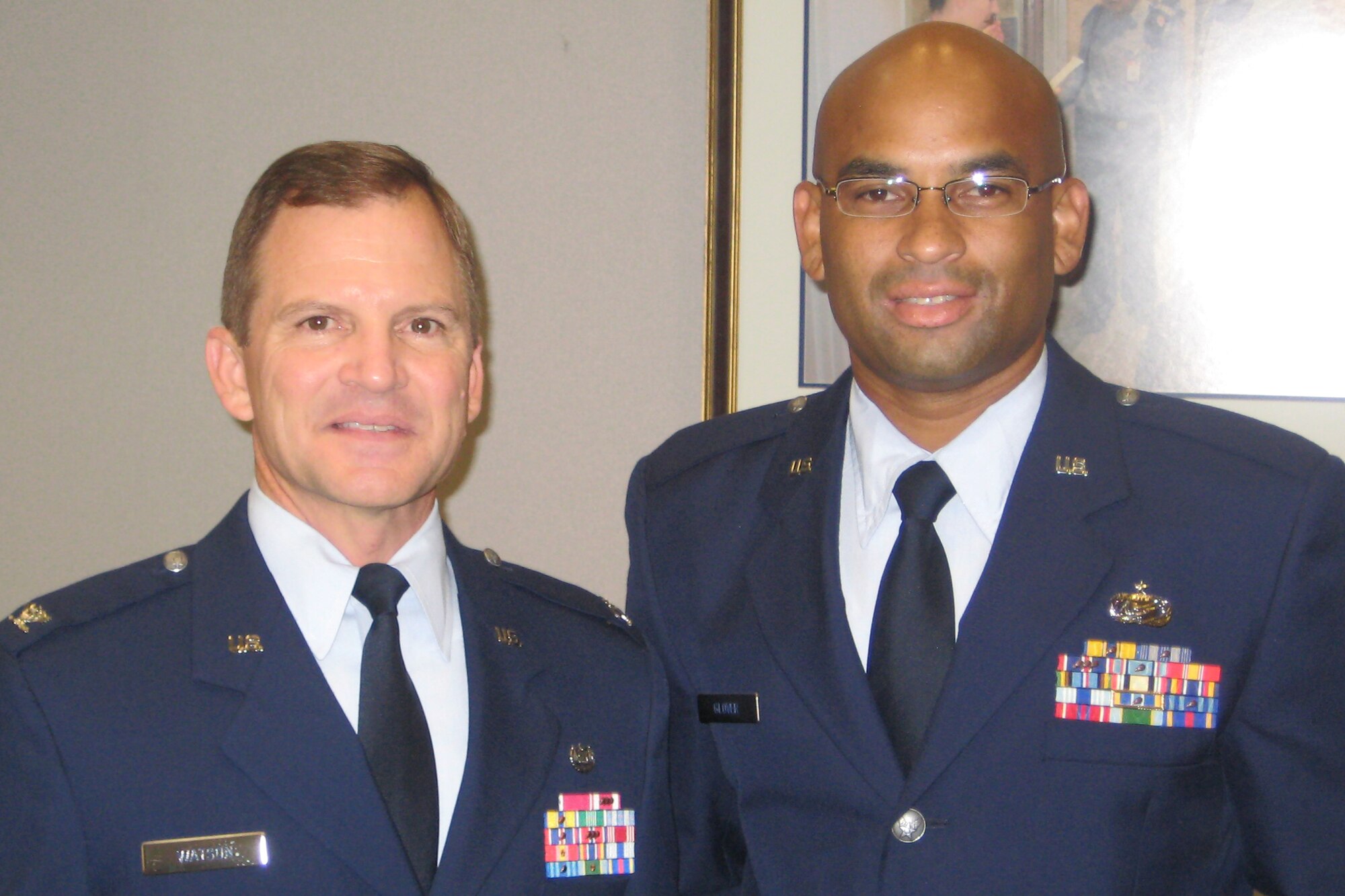 Retired Col. Jeffrey Watson and Julian Glover share a moment before Mr. Glover's commissioning to the rank of second lieutenant. (courtesy photo)