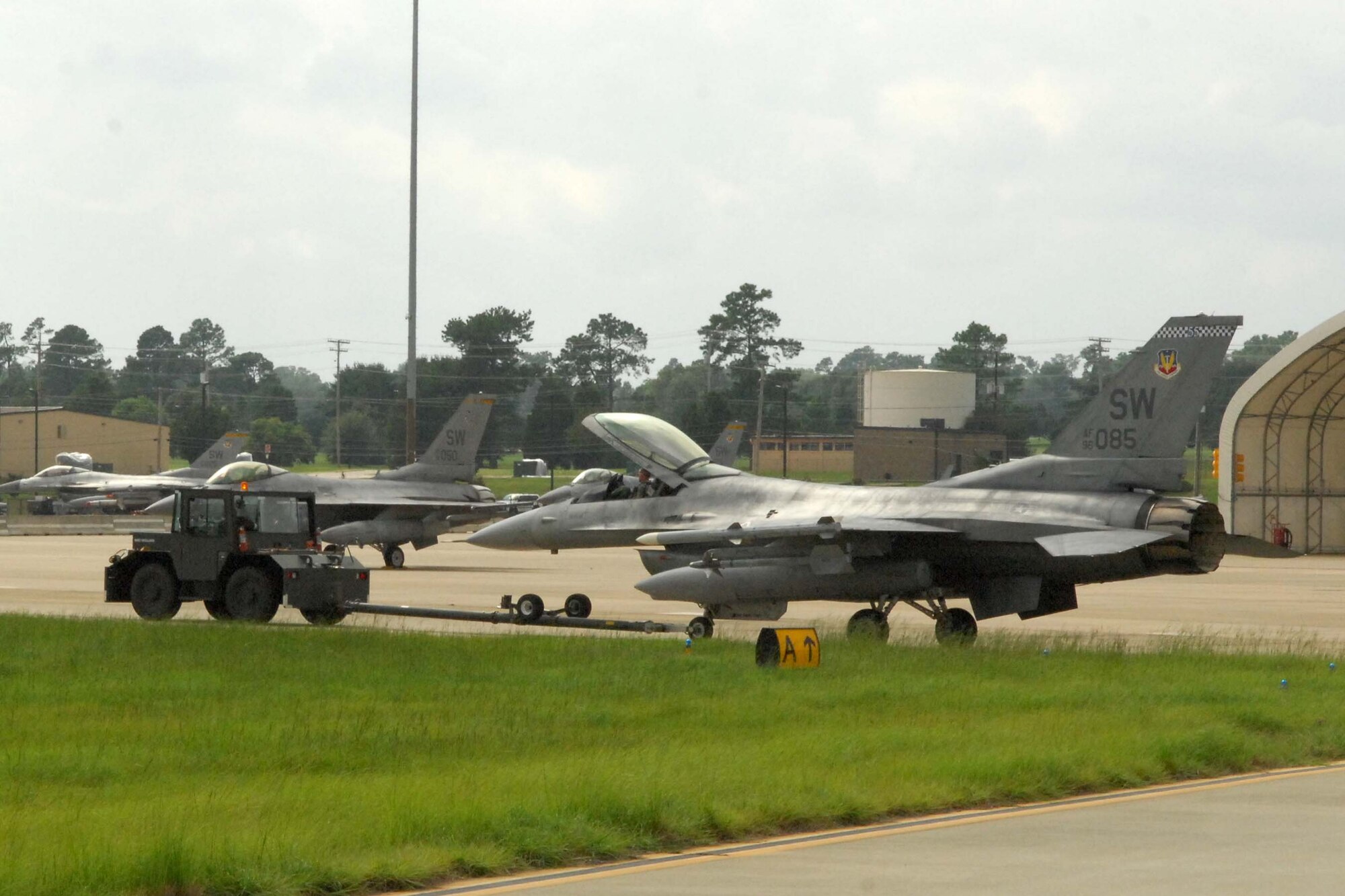 SHAW AIR FORCE BASE, S.C. -- Airmen from the 20th Aircraft Maintenance Squadron found an error with an F-16 Fighting Falcon during final checks at the end of runway inspection during a Phase II Operational Readiness Exercise Aug. 26. Safety is vital in flightline operations and the aircraft will return for maintenance. OREs provide vital training and prepare Airmen for worldwide deployment. (U.S. Air Force photo/Senior Airman William Coleman)