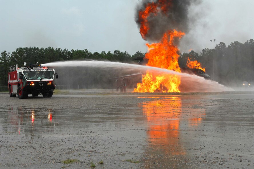 SHAW AIR FORCE BASE, S.C. -- Firefighters from the 20th Civil Engineer Squadron extinguish a burning aircraft during a Phase II Operational Readiness Exercise Aug. 26. OREs provide vital training and prepare Airmen for worldwide deployment. (U.S. Air Force photo/Senior Airman William Coleman)