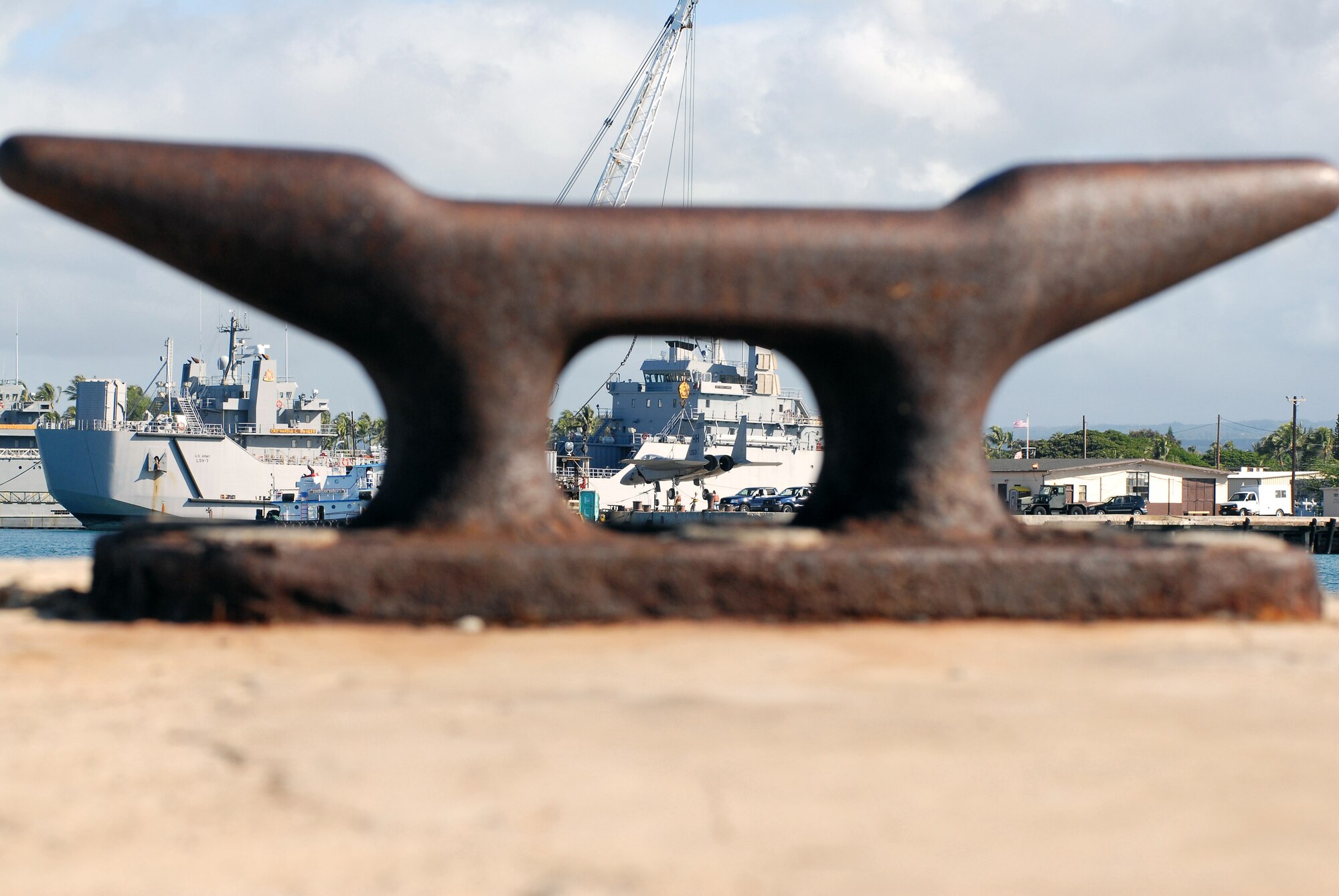 An F-15 Eagle gets a lift from a barge crane for its vogue to the Pacific Aviation Museum Pearl Harbor on Ford Island in Hawaii Aug. 26 at the cargo pier at Hickam Air Force Base, Hawaii. The aircraft was from the 199th Fighter Squadron of the Hawaii Air National Guard. (U.S. Air Force photo/Master Sgt. Robert Burgess) 
