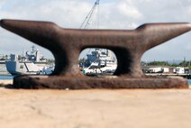 An F-15 Eagle gets a lift from a barge crane for its vogue to the Pacific Aviation Museum Pearl Harbor on Ford Island in Hawaii Aug. 26 at the cargo pier at Hickam Air Force Base, Hawaii. The aircraft was from the 199th Fighter Squadron of the Hawaii Air National Guard. (U.S. Air Force photo/Master Sgt. Robert Burgess) 