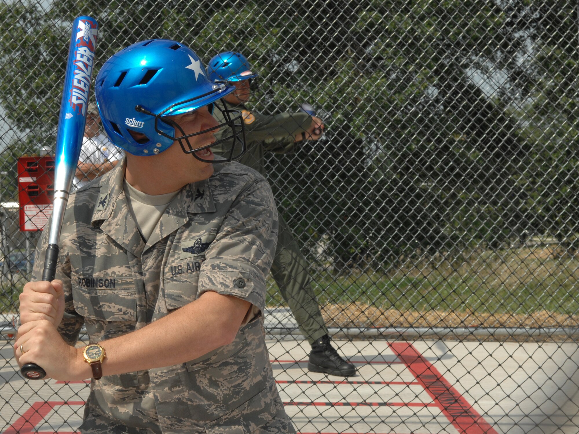WHITEMAN AIR FORCE BASE, Mo. – Col. John Robinson, 509th Bomb Wing vice commander, steps up to the plate at the batting cages grand opening Aug. 27. The batting cages are open from sun rise to sun down and are free of charge until January. The batting cages cost $145,000 and were largely paid for by recycling. (U.S. Air Force photo/Airman 1st Class Stephen Linch)