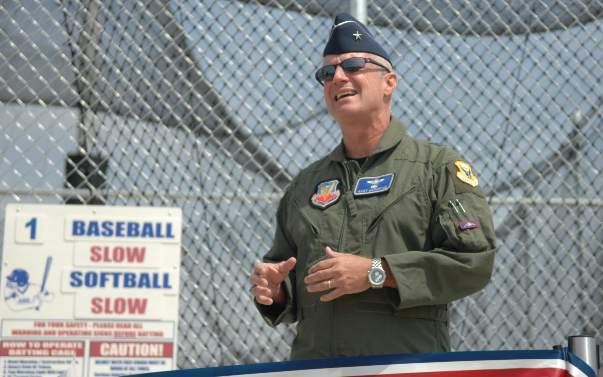 WHITEMAN AIR FORCE BASE, Mo. – Brig. Gen. Gary Harencak, 509th Bomb Wing commander, speaks at the batting cages grand opening Aug. 27. The batting cages are open from sun rise to sun down and are free of charge until January. The batting cages cost $145,000 and were largely paid for by recycling. (U.S. Air Force photo/Airman 1st Class Stephen Linch)