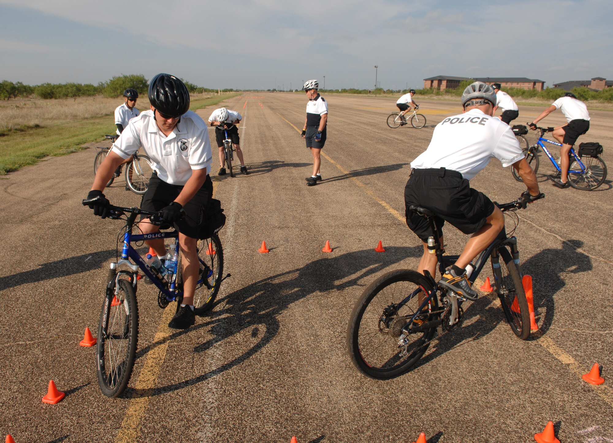 Members of the 17 SFS line up during a basic bicycle skills training course Aug. 22 on Goodfellow. Members of the 17 SFS took the course to augment Goodfellow’s security patrols with bikes. (U.S. Air Force photo by Staff Sgt. John Barton)