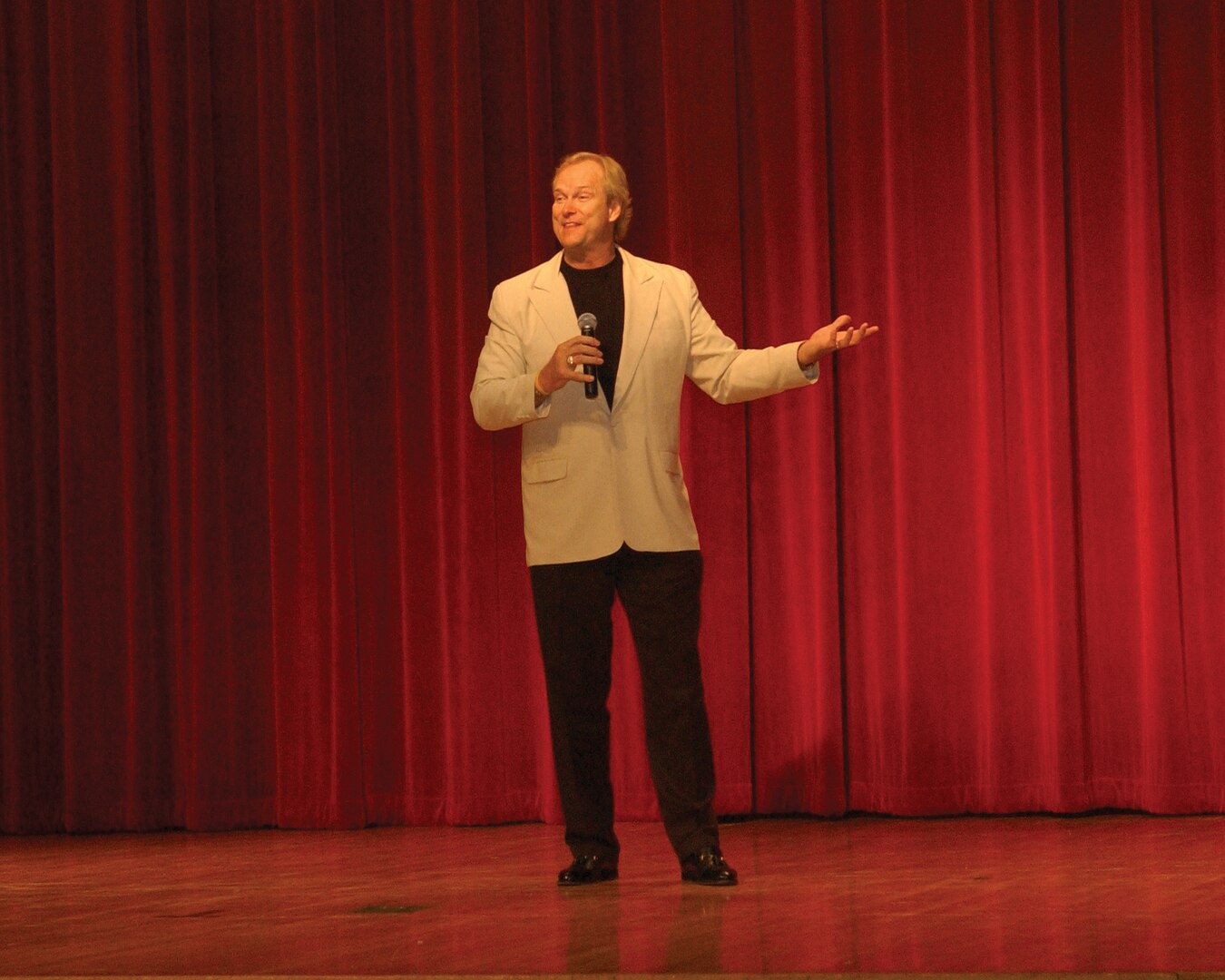8/19/2008 - Dan Clark addresses members of Team Lackland in the Bob Hope Performing Arts Center Aug. 19. Mr. Clark is a motivational speaker who has spoken to military audiences all over the world. (USAF photo by Alan Boedeker)