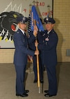 8/25/2008 - Lt. Col. Douglas McCobb accepts the 321st Training Squadron flag from Col. Edward Westermann, 737th Training Group commander, during a re-activation ceremony Aug. 25. (USAF photo by Alan Boedeker) 