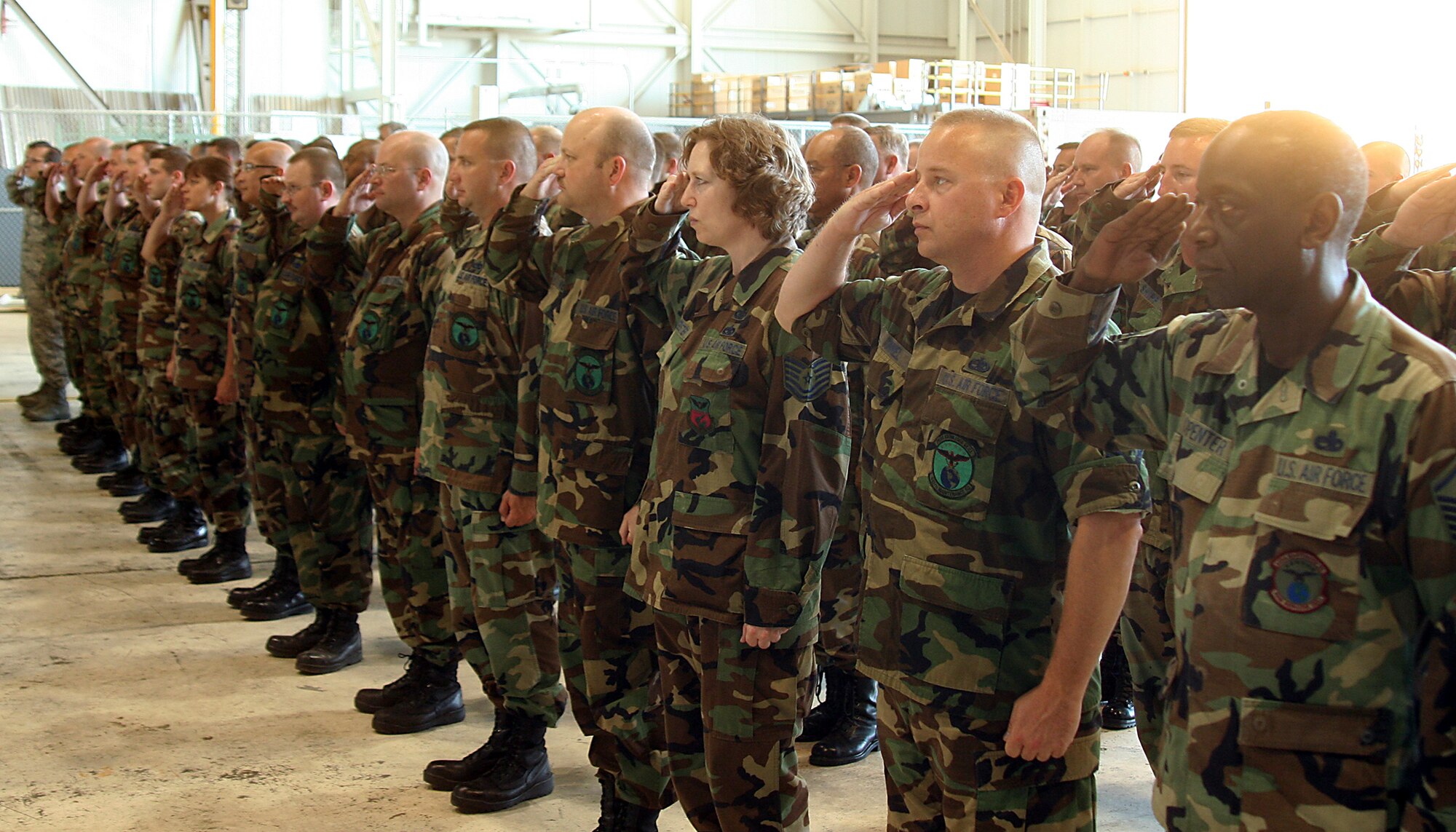 Members of the 445th Maintenance Squadron render their first salute to the new squadron commander Maj. Jay M. Smeltzer during a Change of Command Ceremony on August 3, 2008 at Wright-Patterson AFB, Ohio. Lt. Col. Michael E. Clark relinquished command of the 445th Maintenance Squadron to Maj. Jay M. Smeltzer.  As Major Smeltzer assumed command he offered these words to his new squadron. "Everything we do here counts. When these planes leave here, other Airmen are depending on them. Don't ever forget that."  (U.S. Air Force photo by Senior Airman Ken LaRock)