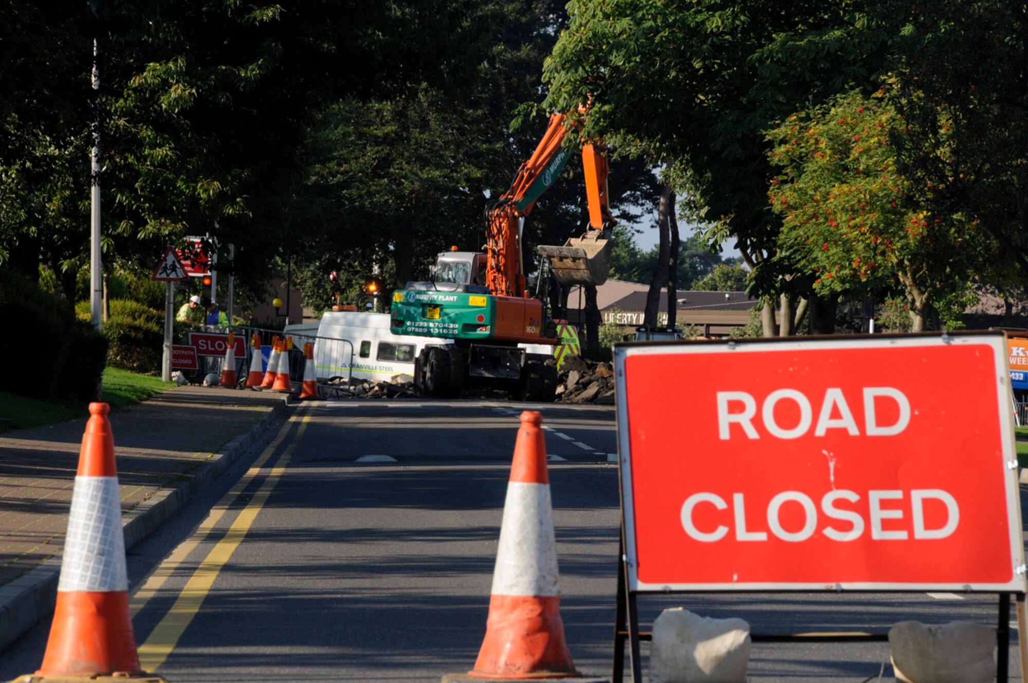 British contractors pave a round-about on Norwich road on RAF Lakenheath, Aug. 29. The road will be closed through the weekend for the final construction. (U.S. Air Force photo by Senior Airman Brian J. Ellis)