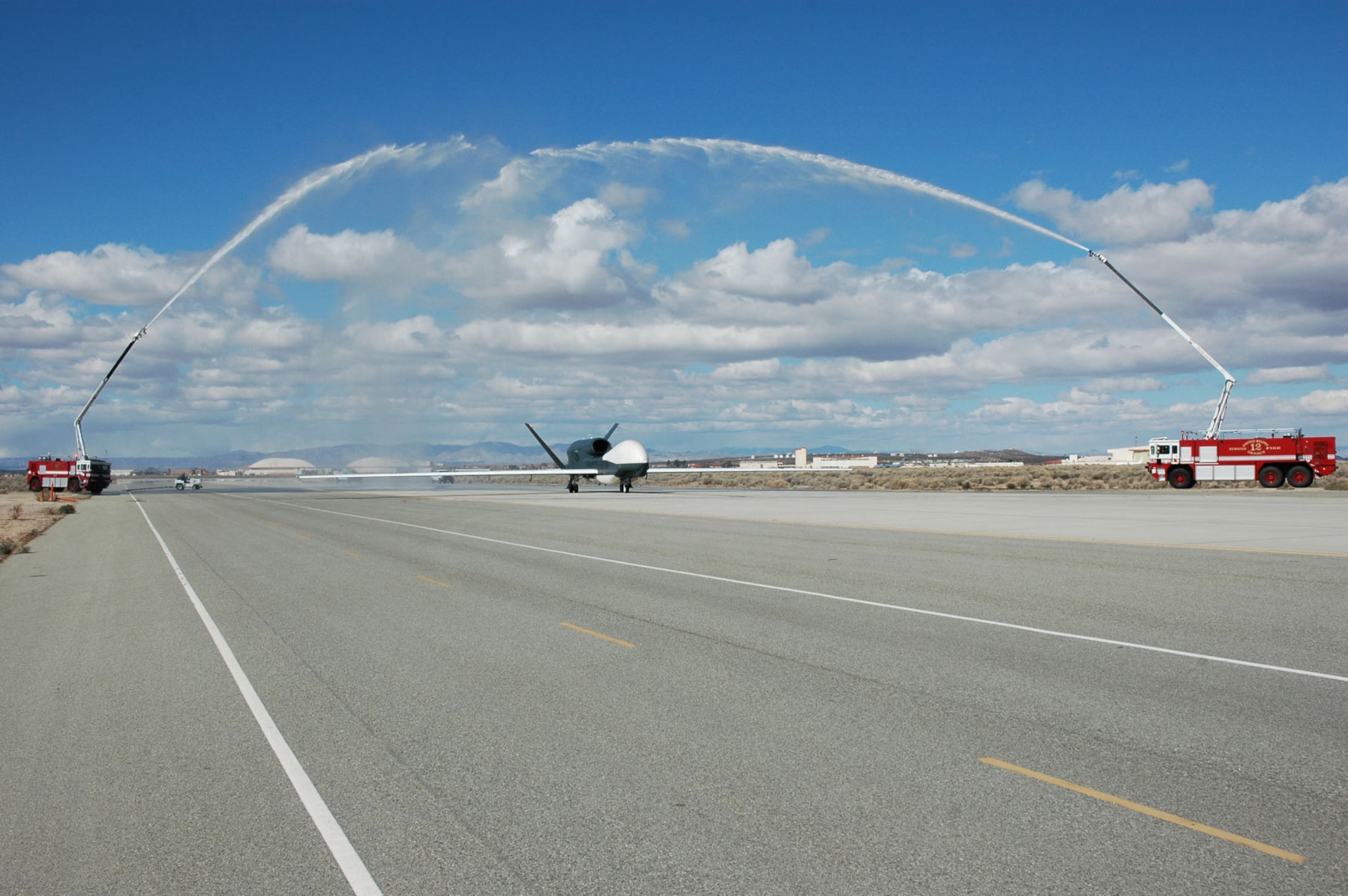 The return of AV-3 to Edwards Air Force Base, Calif., was celebrated with fire trucks shooting streams of water over the aircraft. (Photo courtesy of Mo Pourmand)