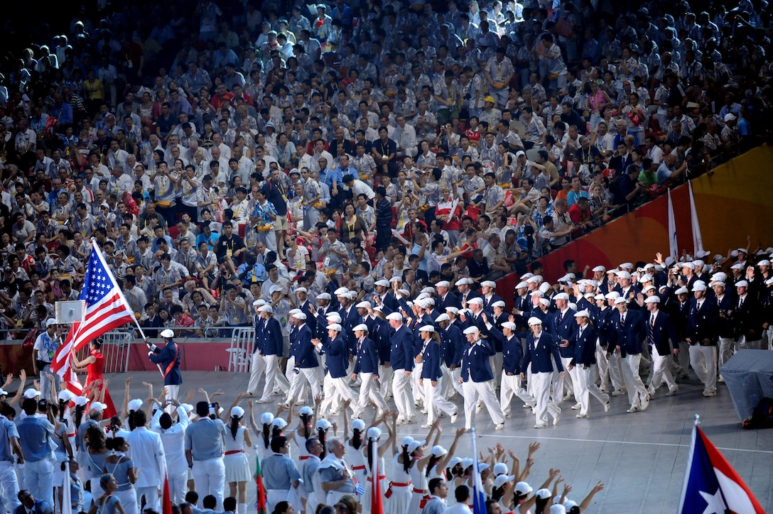 The march of nations featured Olympic athletes from 205 countries, led into the stadium by Greece, in accordance with tradition. The host team from China concluded the march of nations. 

As members of Team USA entered, they clearly received the loudest ovation of the evening -- until Houston Rockets basketball star Yao Ming led the Chinese contingent into the stadium. 

The throng representing 596 U.S. athletes occupied more than 100 meters of the running track during the parade of nations in the Olympic Opening Ceremony in Beijing, Aug. 8, 2008. As U.S. flag bearer Lopez Lomong was rounding the turn, members of Team USA were still filing into the arena from the opposite end of the stadium. 

