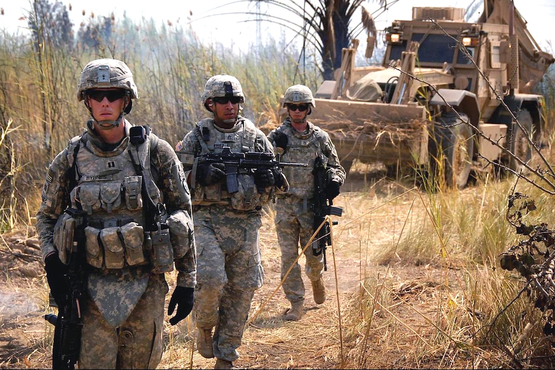 U.S. Army Capt. Joe Byrnes, Staff Sgt. Moises Ramirez, and Staff Sgt ...