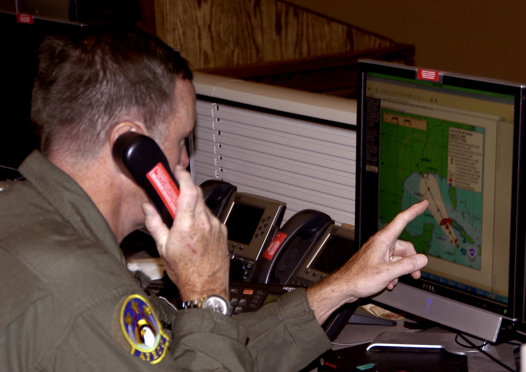 Chief Master Sgt. Steve Bell, JPRC Search and Rescue Controller, monitors the path of Hurricane Gustav. The JPRC is specialty team of America's AOC that coordinates large-scale Search and Rescue opeartions during contigencies such as hurricanes or other natural or man-made disasters.                                                               