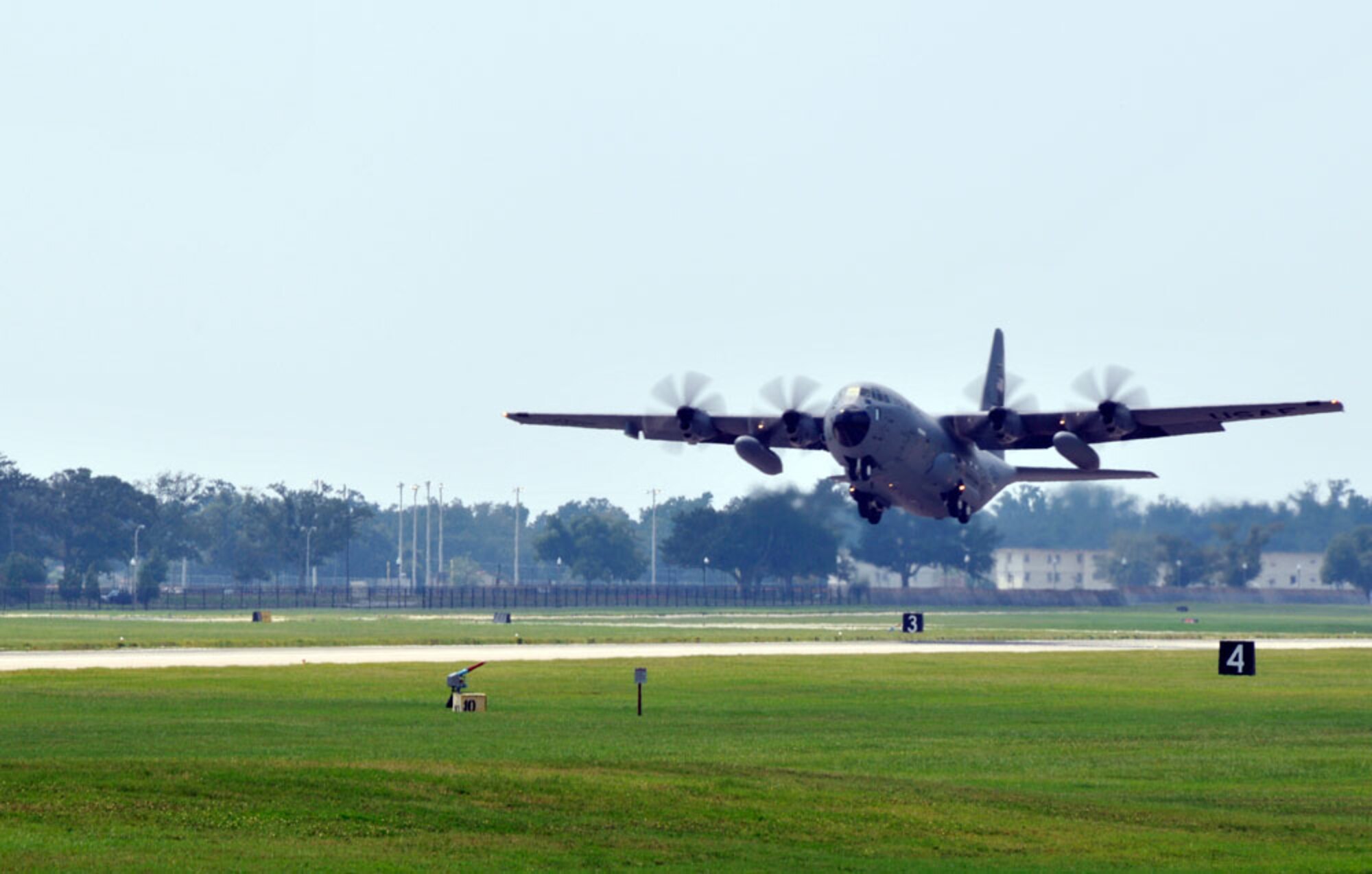 The last WC-130J to evacuate Keesler lifts off gently into the air over the flightline on its way to Homestead Air Reserve Station near Miami to support ongoing missions into Hurricane Gustav and flights beginning tomorrow into Tropical Storm Hannah. Citizen Airmen of the 53rd Weather Reconnaissance Squadron, known as the Hurricane Hunters, have been tracking Gustav over the past several days as it has grown from a depression into a Category 4  hurricane by 2 pm.m today. These Reservists fly missions into these powerful storms to provide the best possible data used by forecasters at the National Hurricane Center to project the direction and intensity.   (U.S. Air Force Photo/Tech. Sgt. James B. Pritchett)
