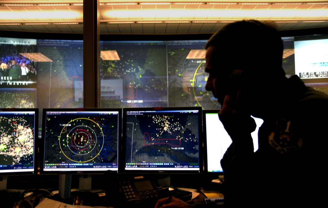 Colonel Michael Hare, AFNSEP director, works the phones at the 601st Air and Space Operations Center while monitoring the movements of Hurricane Gustav.  1st Air Force (AFNORTH) remains fully staffed throughout the Labor Day weekend, keeping tabs on Gustav's path and preparing for defense support of civil authorities taskings.  (U.S. Air Force photo by 1st Lt. Jared Scott)                           