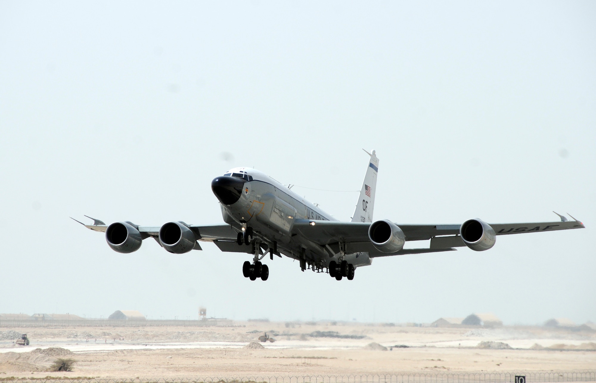 An RC-135 Rivet Joint from the 45th Expeditionary Reconnaissance Squadron takes off for a mission here Aug. 26, 2008. The 45 ERS supports theater and national-level consumers with near real-time on-scene intelligence collection, analysis and dissemination. (U.S. Air Force by Tech. Sgt. Michael Boquette)