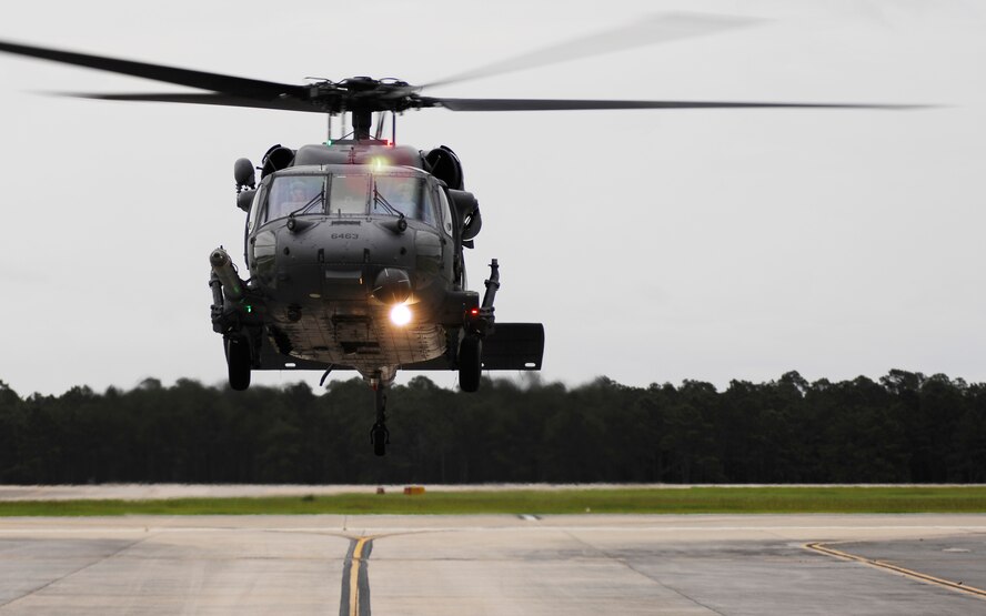 MOODY AIR FORCE BASE, Ga. -- A 41st Rescue Squadron HH-60G Pave Hawk performs a pre-deployment hover inspection here Aug. 31. The 41st RQS is preparing to enter storm ravaged areas of the Gulf Coast with other rescue and support units of Moody's 23rd Wing as part of the national response framework for Hurricane Gustav. (U.S. Air Force photo by Tech. Sgt. Parker Gyokeres) 