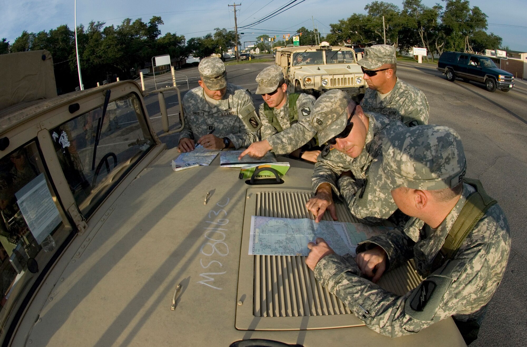 Army National Guard soldiers review neighborhood maps prior to visiting mobile home residents in Gulfport, Miss., to inform them of a mandatory evacuation order issued Aug. 31. All FEMA trailer residents in Gulfport are under this order in anticipation of Hurricane Gustav making landfall. The Army guardsmen are from A-troop, 1-98 Cavalry Regiment from Pontotoc, Miss. (U.S. Air Force photo/Master Sgt. Jack Braden)