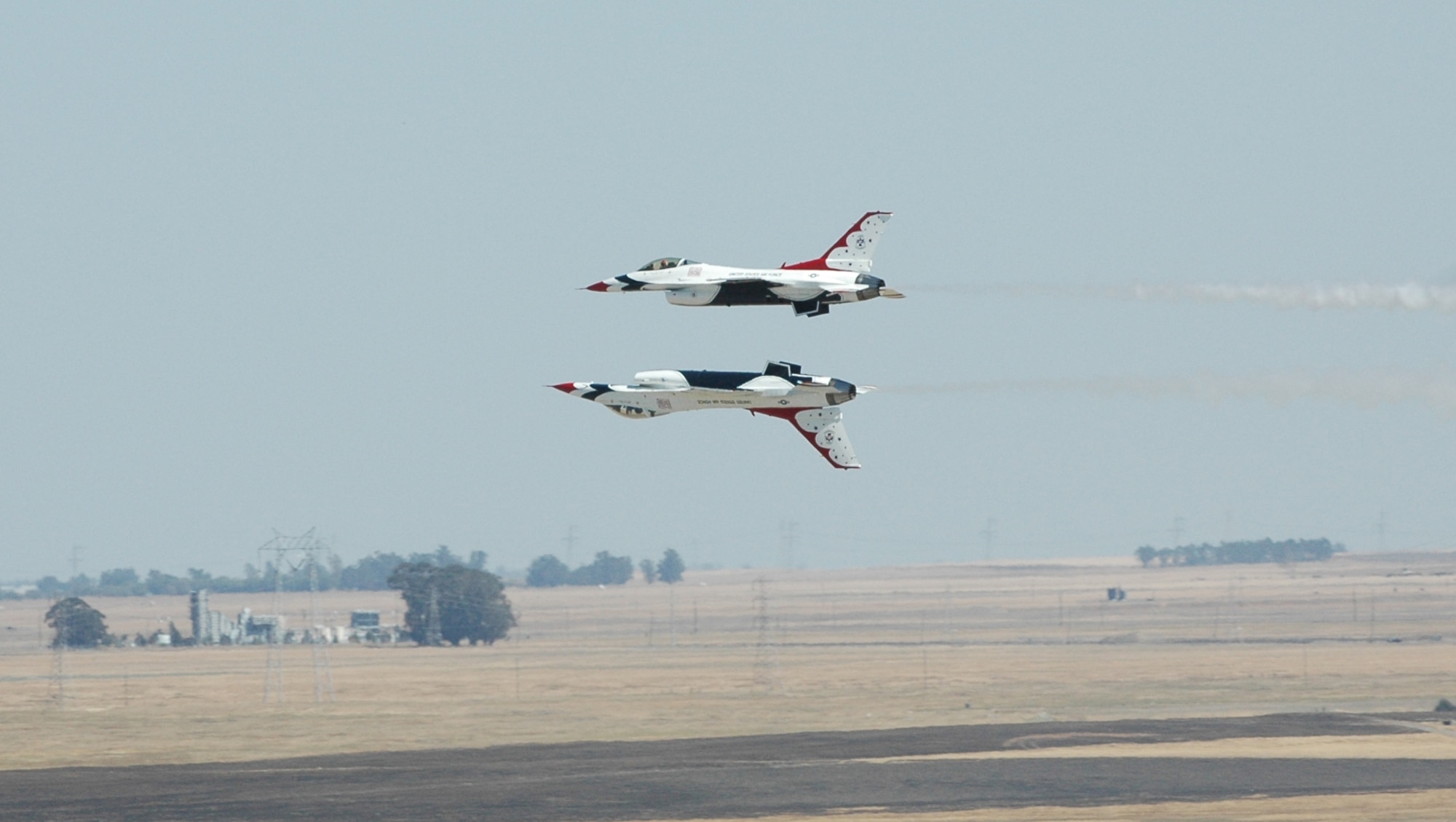 The USAF Thunderbirds, the Air Force's official aerial demonstartion team perform in the skies above Travis Air Force Base, Calif. as part of the 2008 Travis Air Expo, Aug. 30-31. (U.S. Air Force photo/Airman 1st Class Kristen Rohrer)