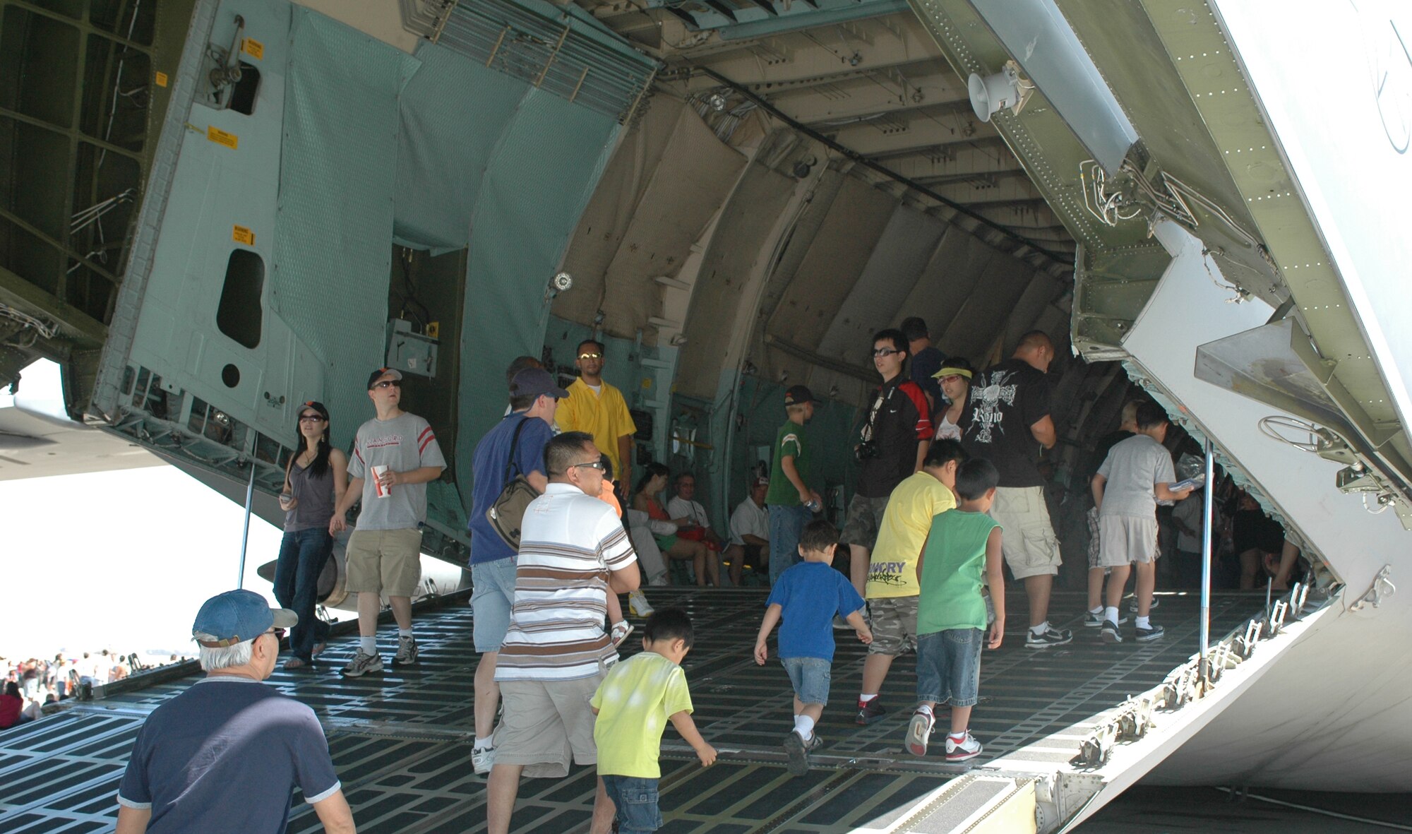 Air Expo spectators make there way up the back ramp of a Travis C-5 Galaxy aircraft at the 2008 Travis Air Expo, Aug. 31. (U.S. Air Force photo/Airman 1st Class Kristen Rohrer)