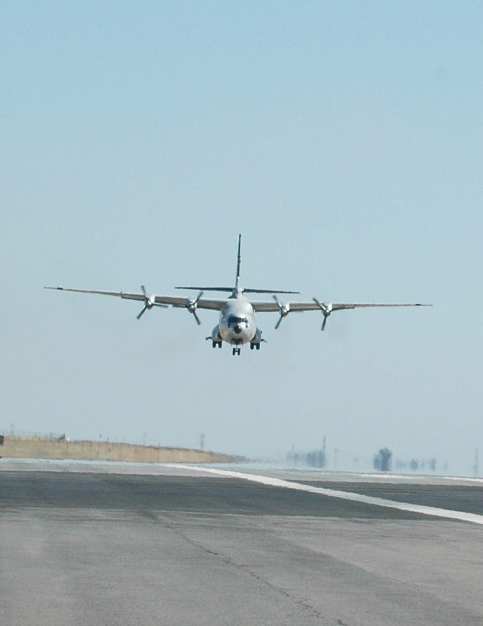 The last flying C-133A Cargomaster makes its final approach during the 2008 Travis Air Expo, Aug. 30. The aircraft will be retired and put on public display at Travis Air Force Base. (U.S. Air Force photo/Kristen Rohrer)