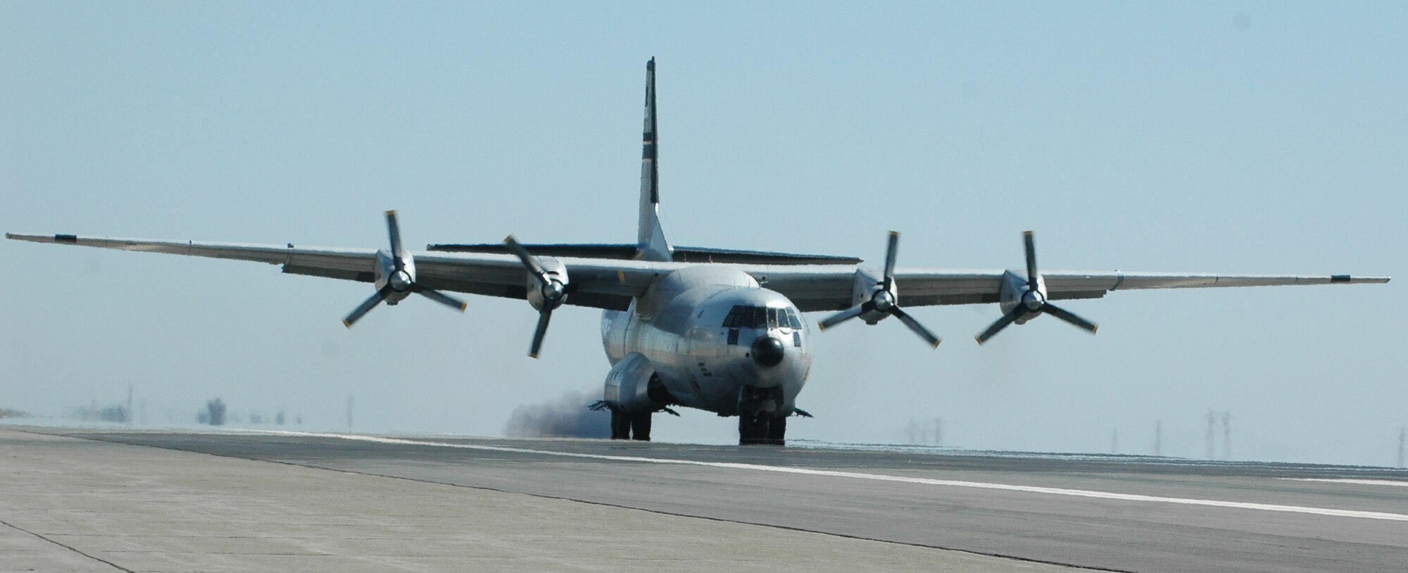 The last flying C-133A Cargomaster makes it's final landing at Travis Air Force Base during the 2008 Travis Air Expo, Aug. 30. The aircraft, which was flew out of Travis AFB from 1958 until its departure in 1971 will be retired and put on display at the base. (U.S. Air Force photo/Kristen Rohrer)