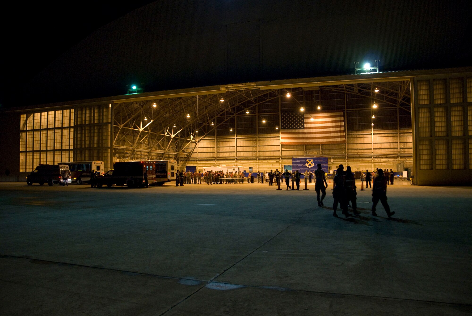 Local ambulances from the San Antonio area standby at a large hanger set up for all night operations at Kelly USA, San Antonio,Texas for arriving patients evcuated by the 136th Airlift Wing,Texas Air National Guard and the 142nd Aeromedical Squadron from the Delaware Air National Guard.San Antonio,Texas, August 30, 2008.(USAF photo by MSgt Michael Lachman)