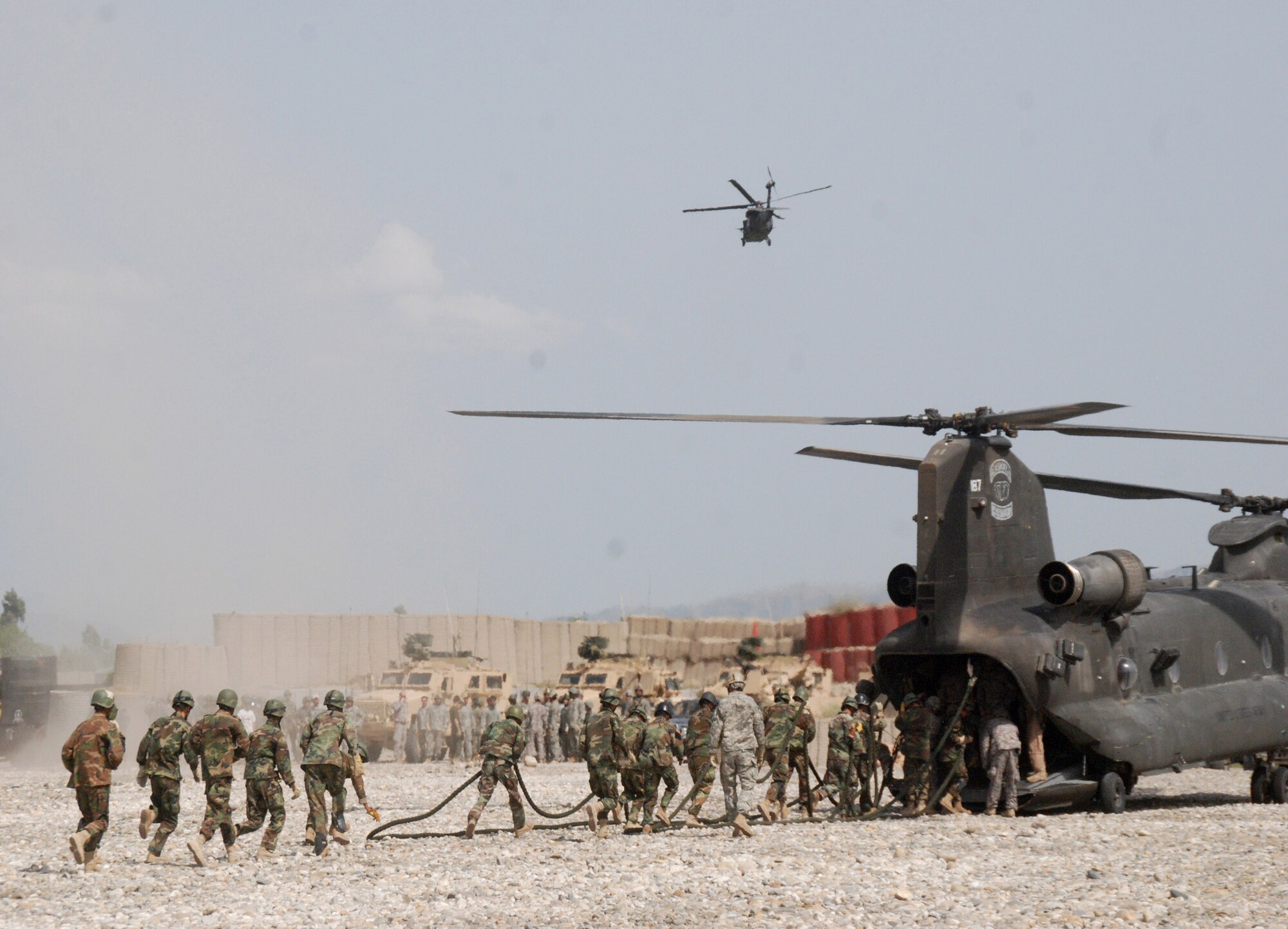 Afghan soldiers secure a rope after completing a fast roping exercise at a satellite outpost near Forward Operating Base Fenty. (U.S. Army photo by Spc. George Welcome)